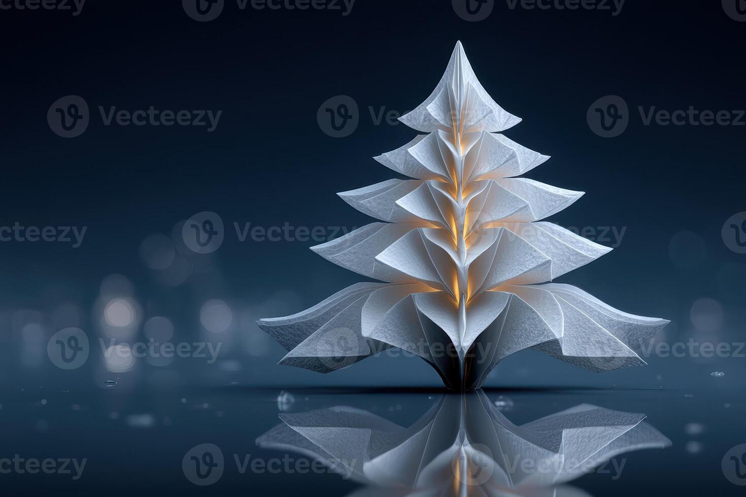 Decorative paper Christmas tree illuminating a winter-themed background in a soft evening glow photo