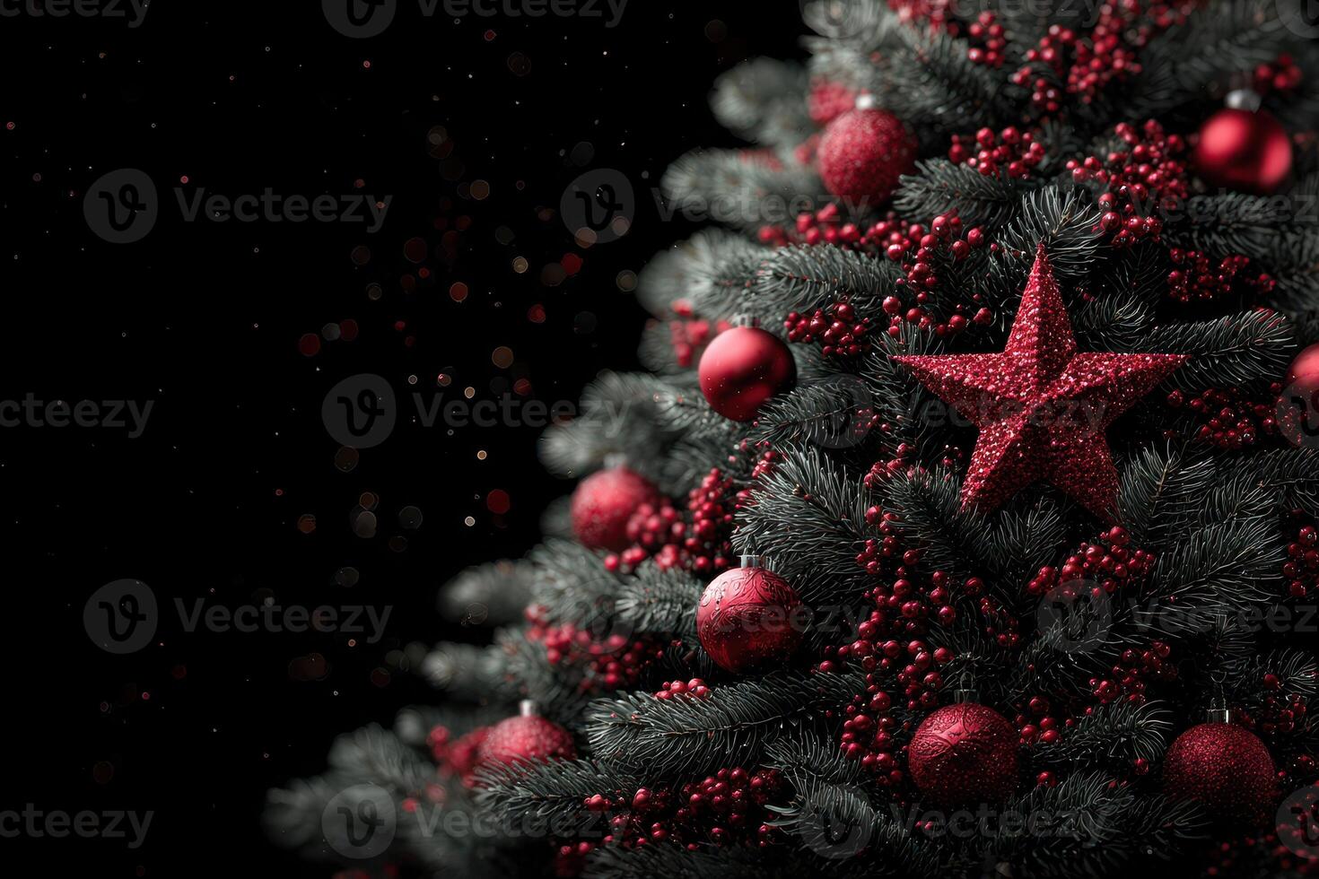 Elegant red and black Christmas tree adorned with ornaments and a star during festive season celebration photo