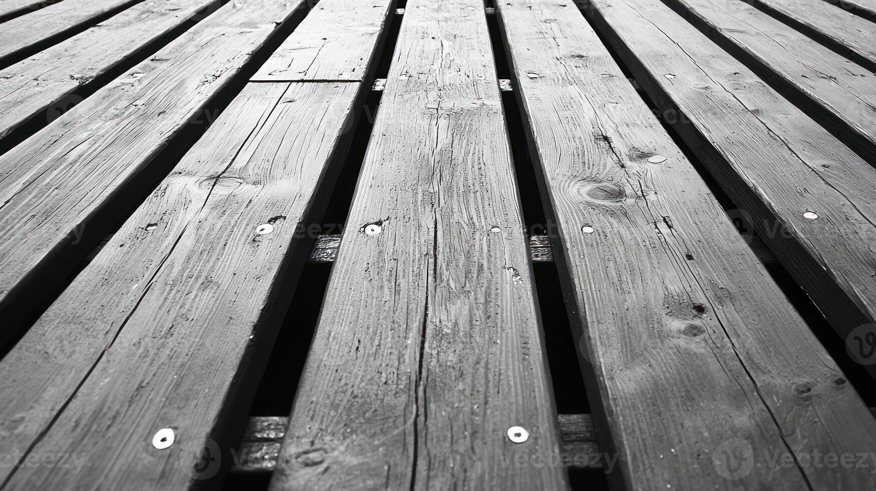 A black and white photo of a bench