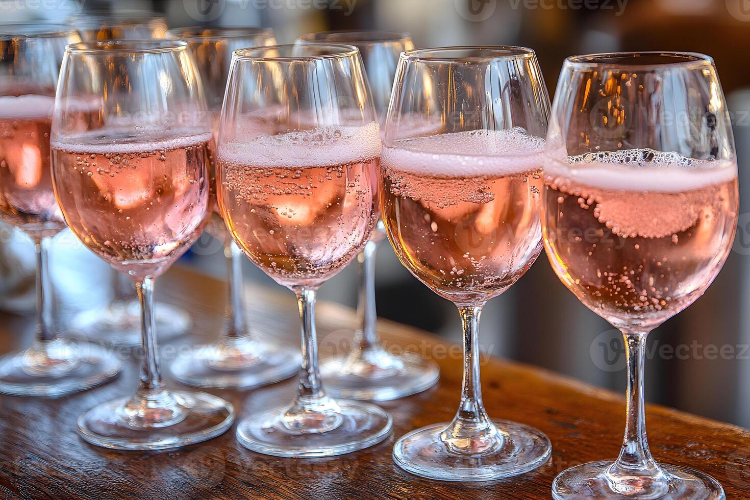 Elegant Celebration with Sparkling Rose Wine Glasses for Festive Gatherings photo