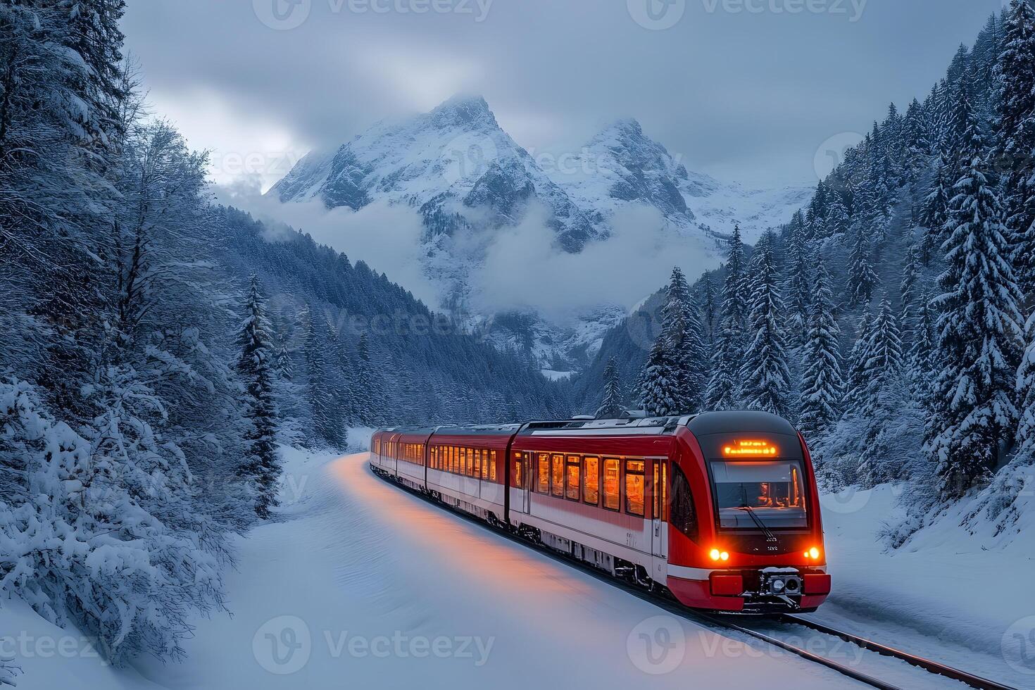 Winter Train Journey Through Snow-Covered Alpine Landscape photo