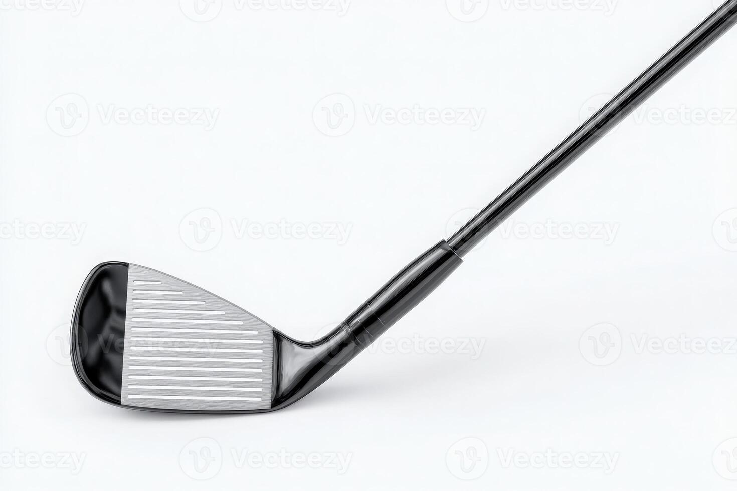 Close-up view of a golf club, focusing on the clubhead with its unique grooves and face angle, suitable for improving precision in swings during a round on the golf course. photo