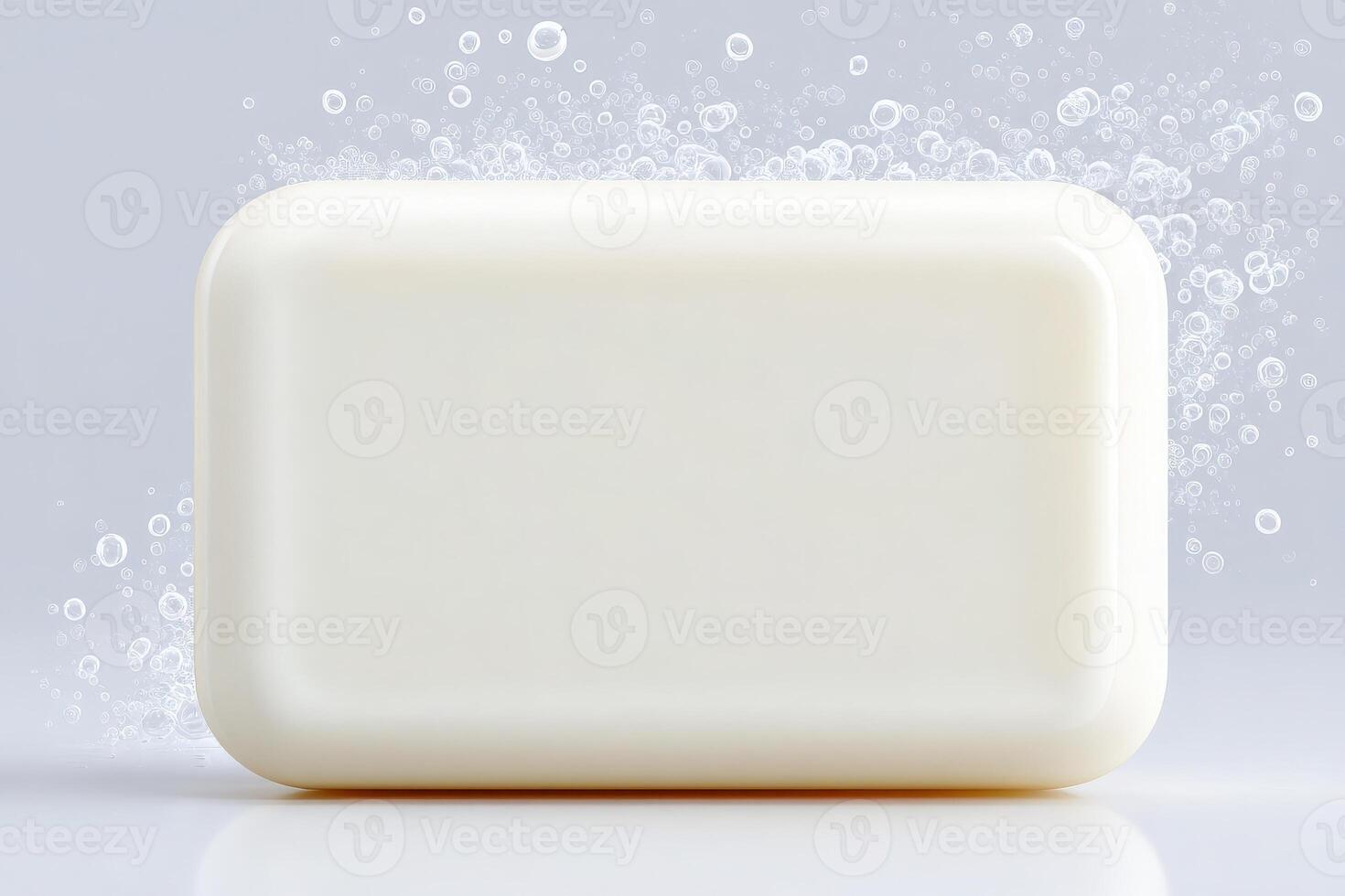 A plain white soap bar rests on a smooth surface, surrounded by floating bubbles that emphasize cleanliness and freshness. The soft gray background adds a soothing touch to the composition. photo