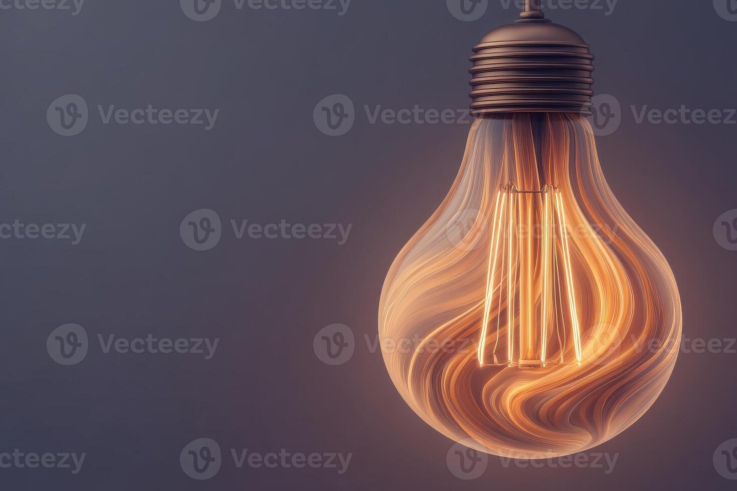 A decorative light bulb featuring an elegant swirling pattern emits a warm, inviting glow, set against a muted grey background. The stylish design adds a touch of sophistication to any space. photo