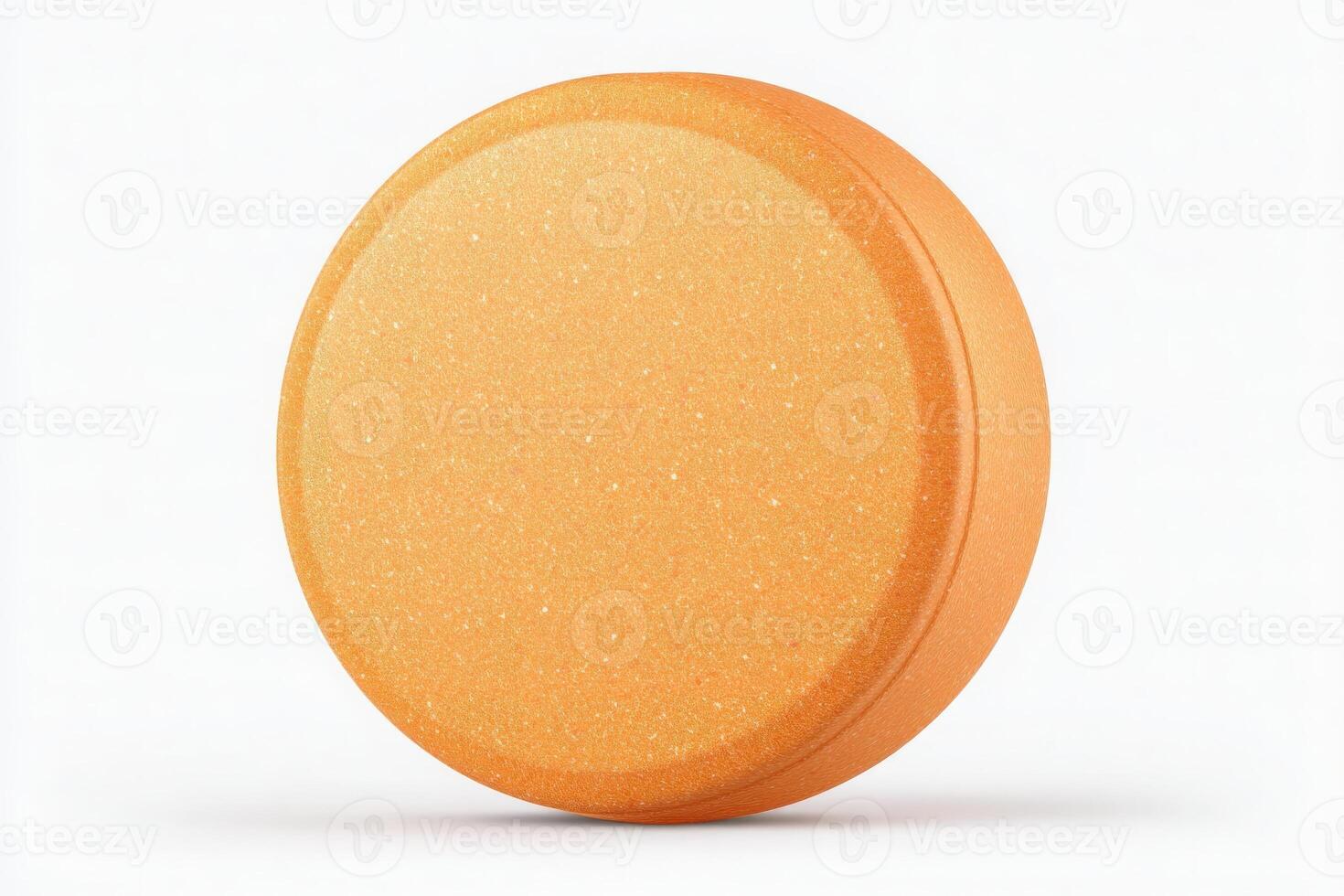A round, textured orange object rests flat on a clean white background, showcasing its vibrant color and smooth surface. The simple design highlights its geometry and bold hue. photo