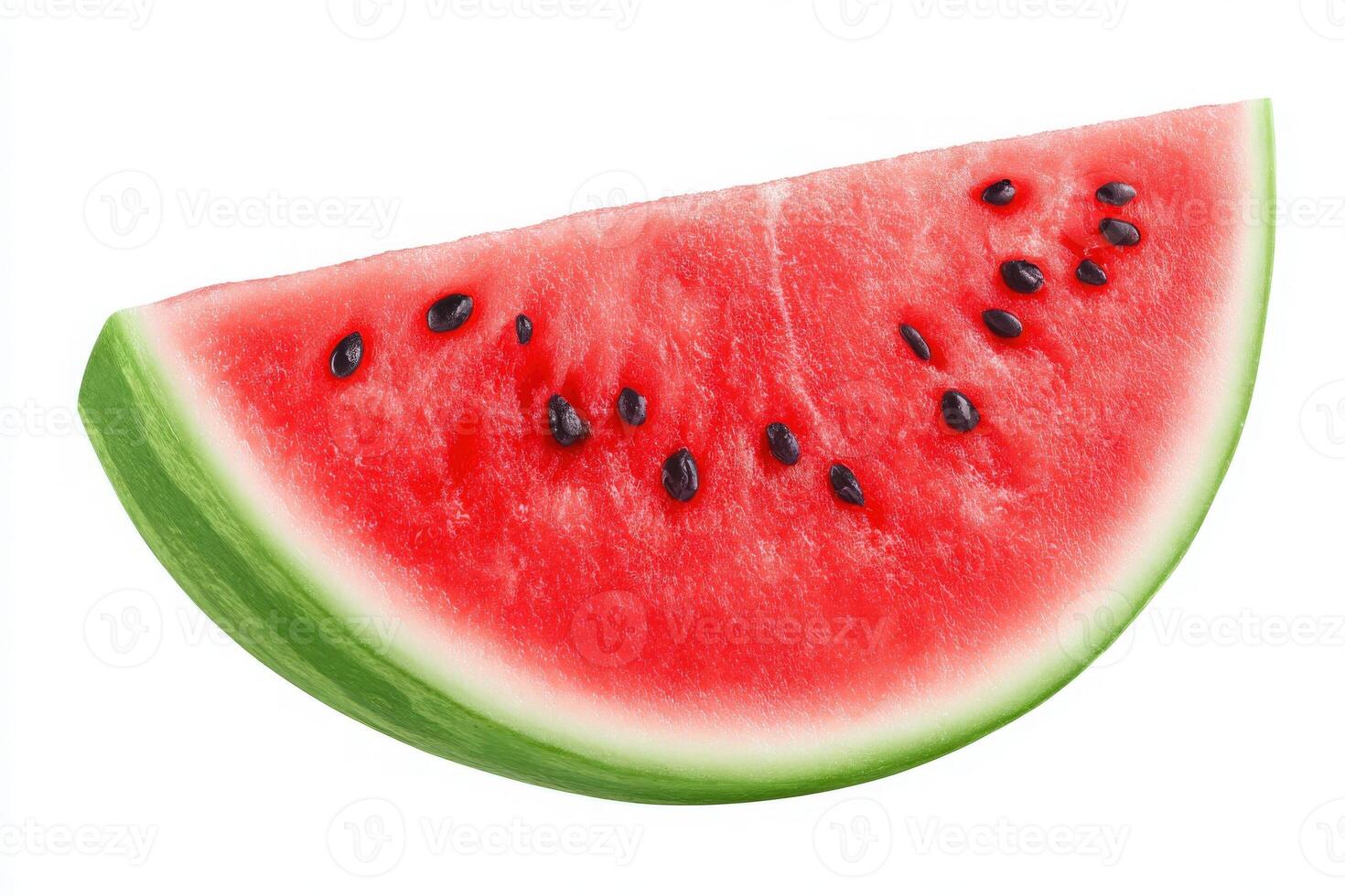 A bright slice of watermelon with a lush green rind and sweet red flesh filled with small black seeds is displayed. This tropical fruit is perfect for enjoying during hot summer days. photo
