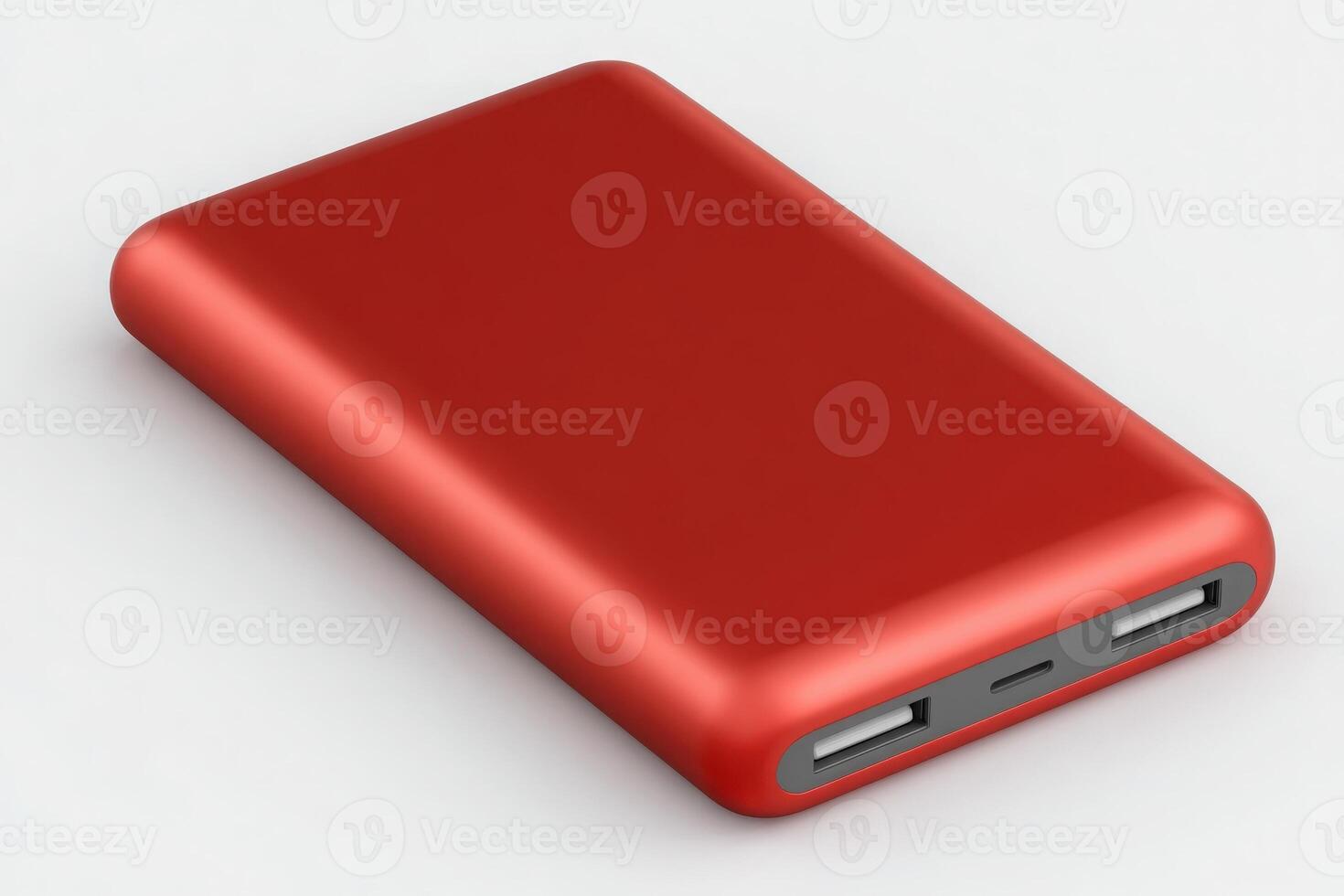 A compact red power bank is displayed featuring dual USB ports for charging multiple devices. Its sleek surface and lightweight design make it ideal for travel and on-the-go use. photo