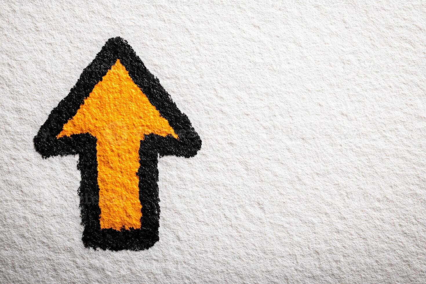 A bold orange arrow outlined in black is depicted on a textured white surface, effectively directing attention upwards. The vibrant colors contrast sharply, providing a clear visual cue. photo