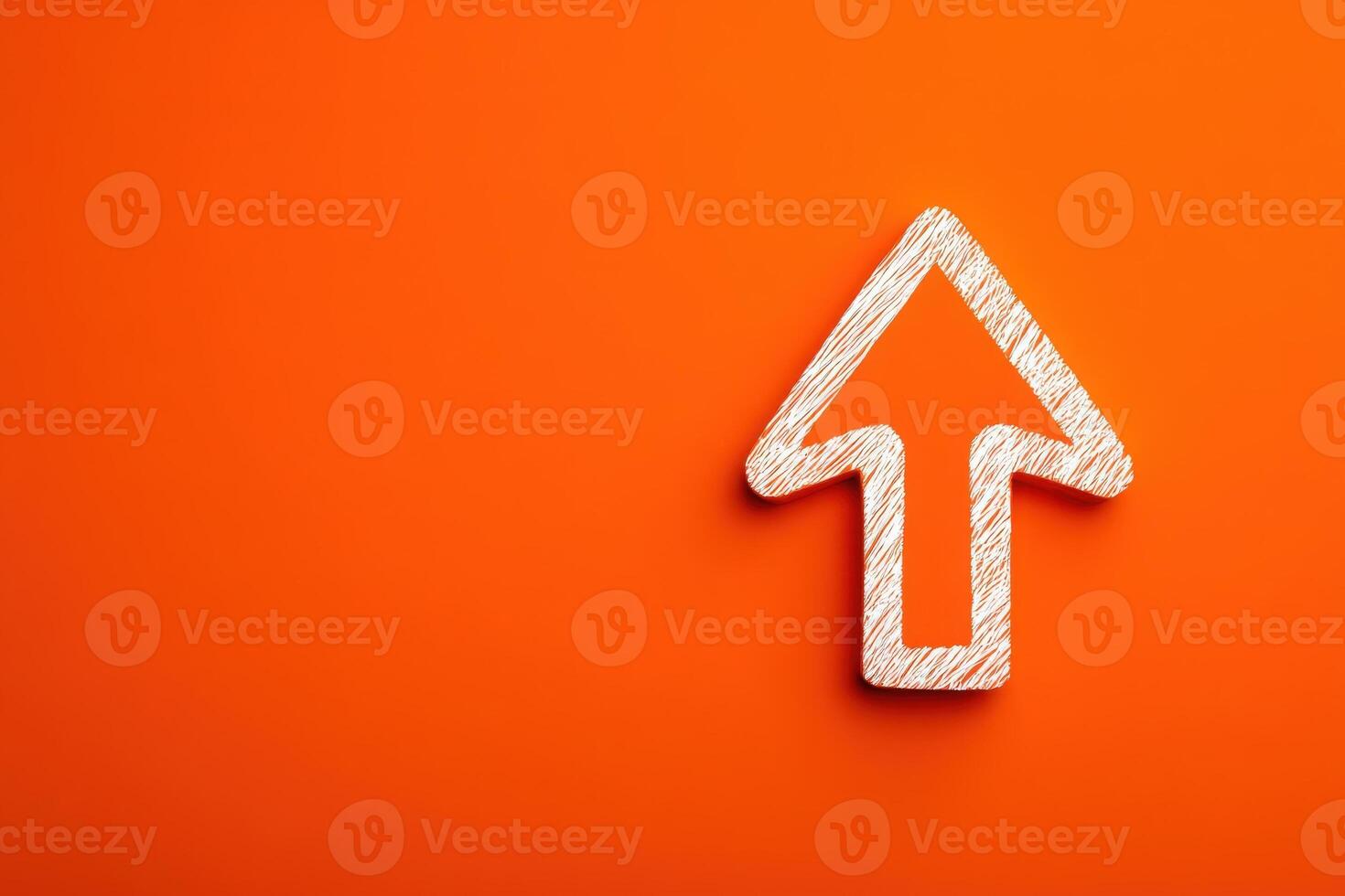 A vibrant orange surface features a prominently displayed white arrow outline that points upwards. The design is simple yet striking, drawing attention to the upward direction. photo