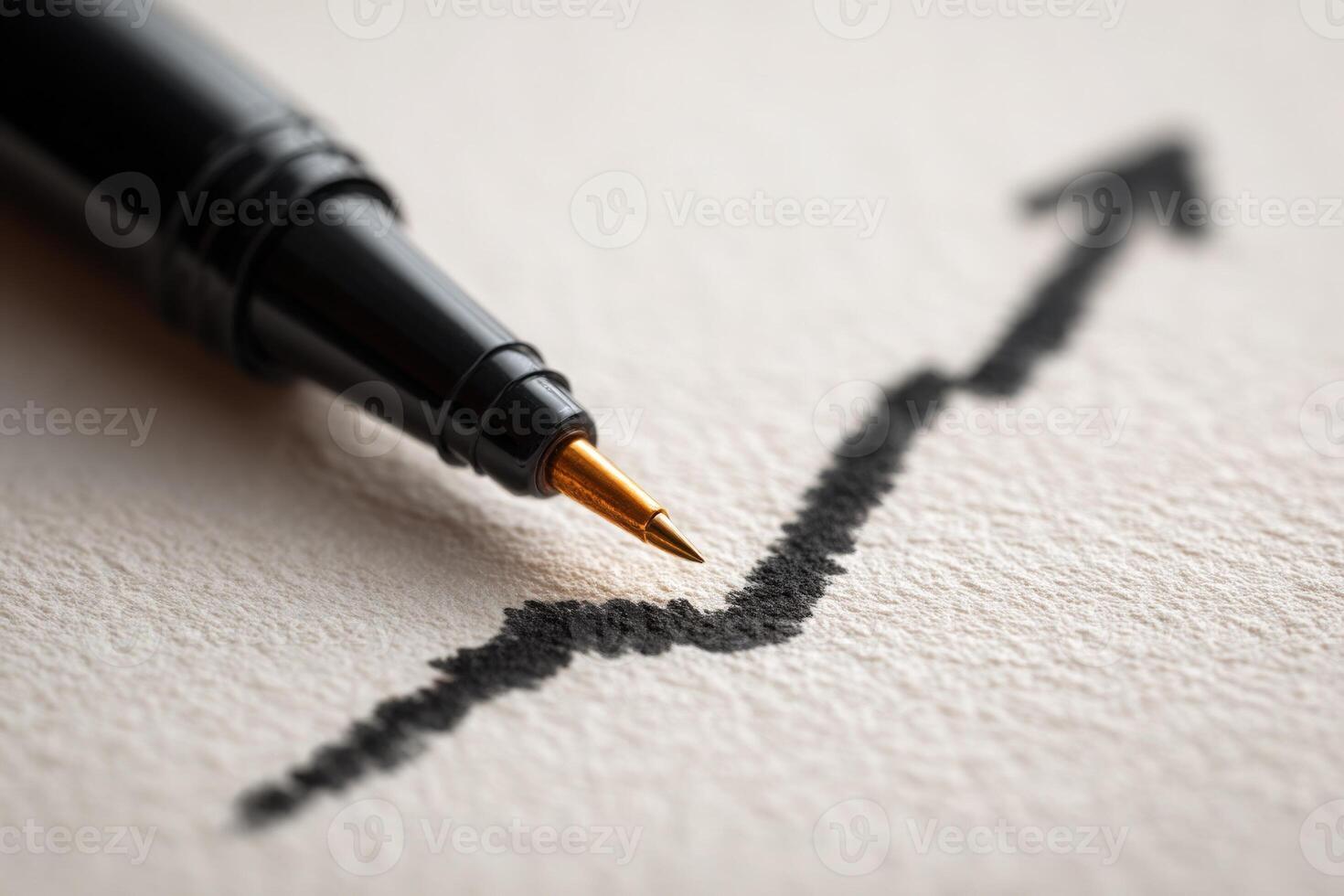 A close-up view of a pen poised above a line graph illustrating upward trends on paper. The artwork captures the essence of financial growth and strategic planning. photo