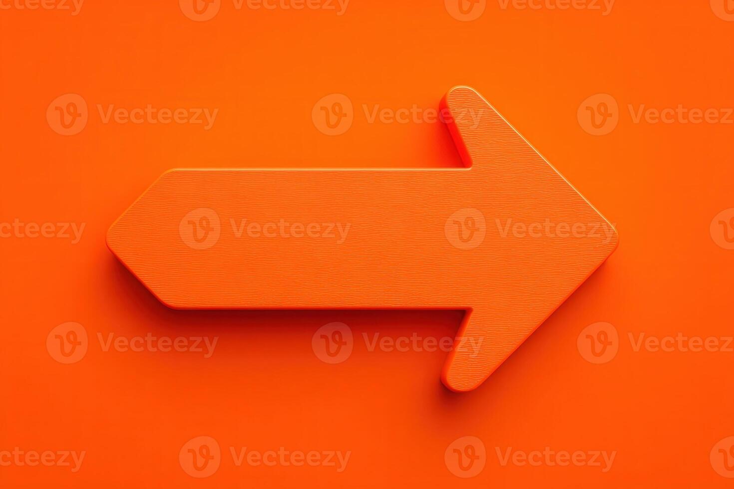 A bold orange arrow points right against a matching background. This striking design could symbolize direction or movement, attracting the viewers eye effectively. photo
