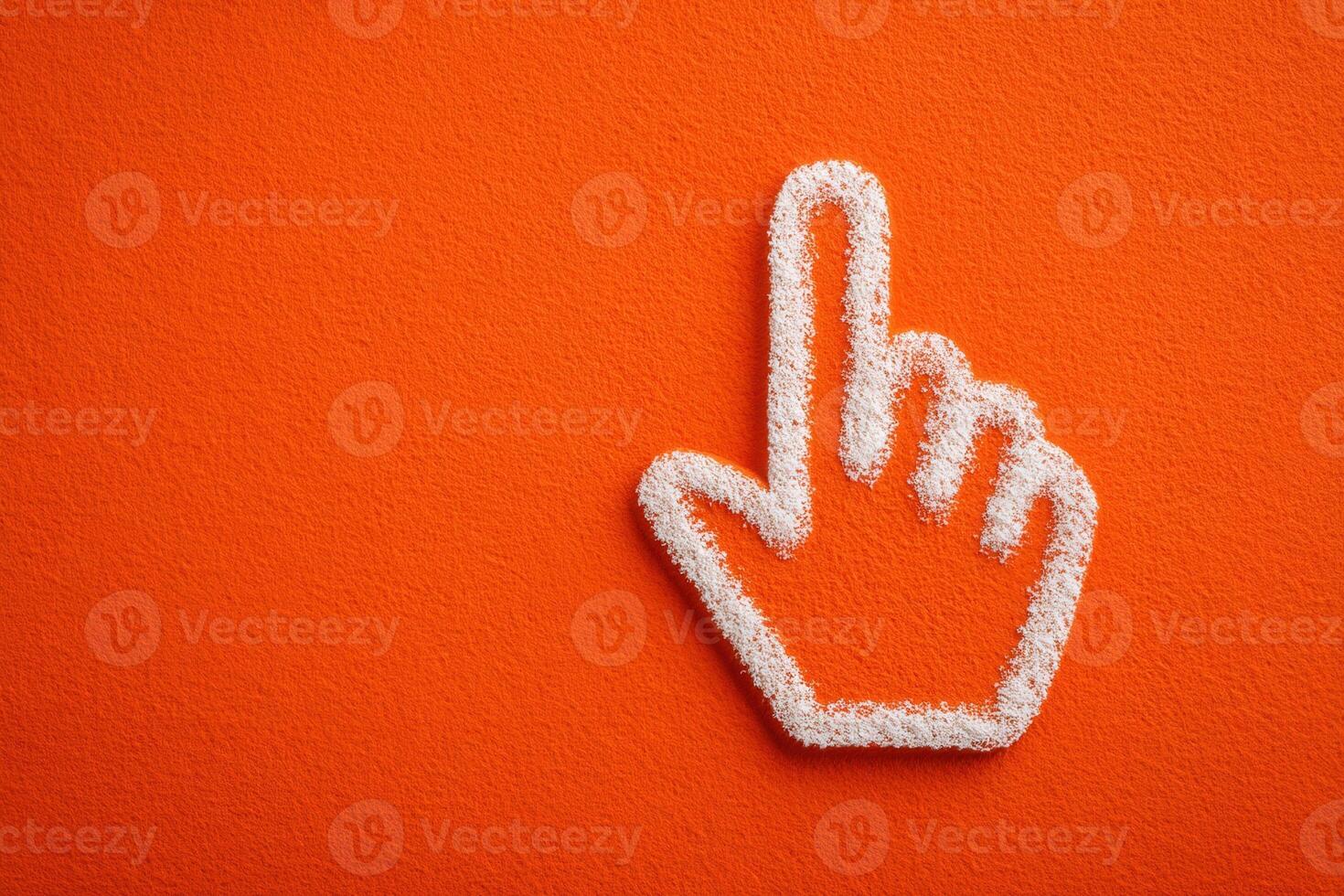 A hand gesture made of white material is prominently placed against a vibrant orange wall. The finger points upward, symbolizing focus or direction. This design creates a striking visual. photo