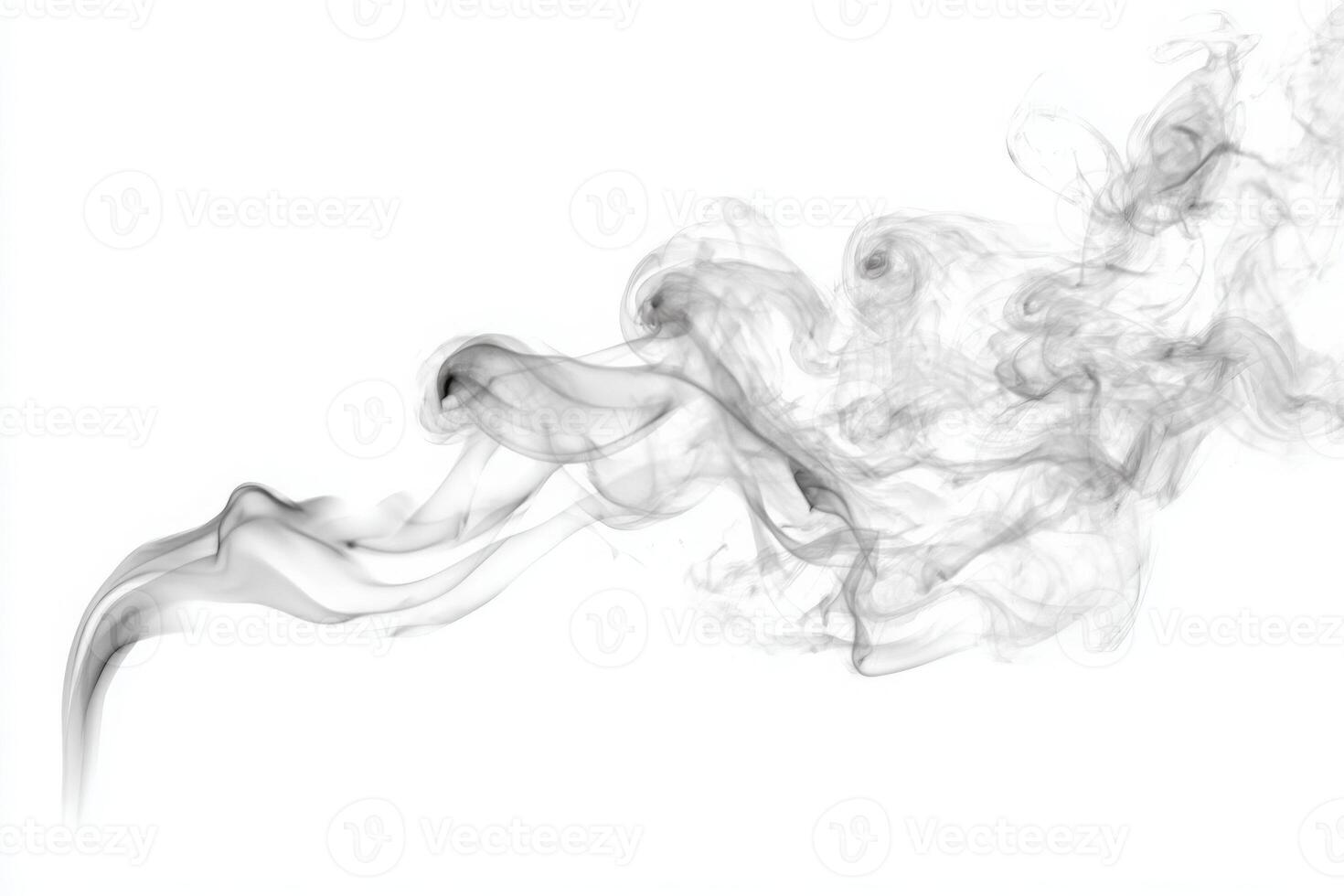 Soft tendrils of smoke dance gracefully in the air, creating fluid shapes. The monochromatic tones enhance the ethereal quality, showcasing the beauty of movement and form. photo
