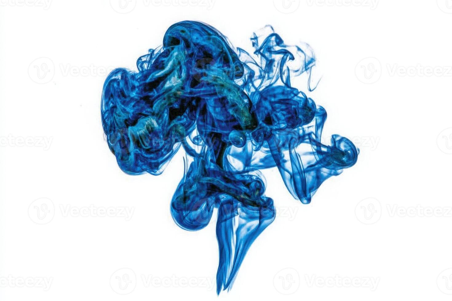 A striking display of blue liquid forms intricate swirls and shapes against a plain white backdrop. The fluid dynamics create a captivating visual with depth and movement. photo