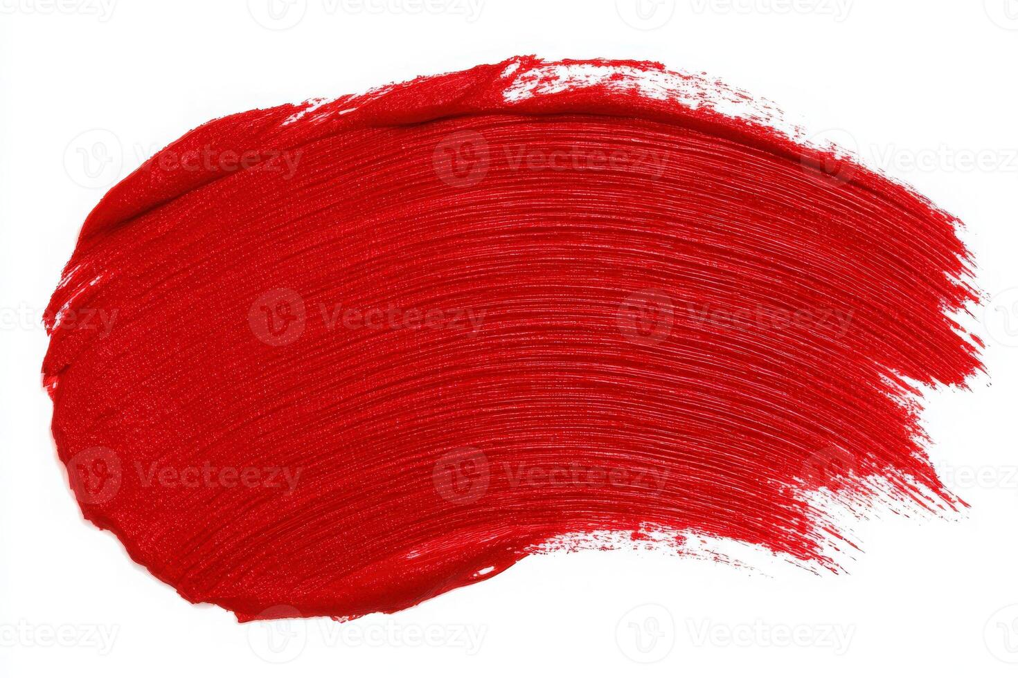 A bold red paint stroke is applied to a clean white surface, emphasizing the smooth texture and vibrant hue. The stroke showcases the interplay of light and shadow, creating visual interest. photo