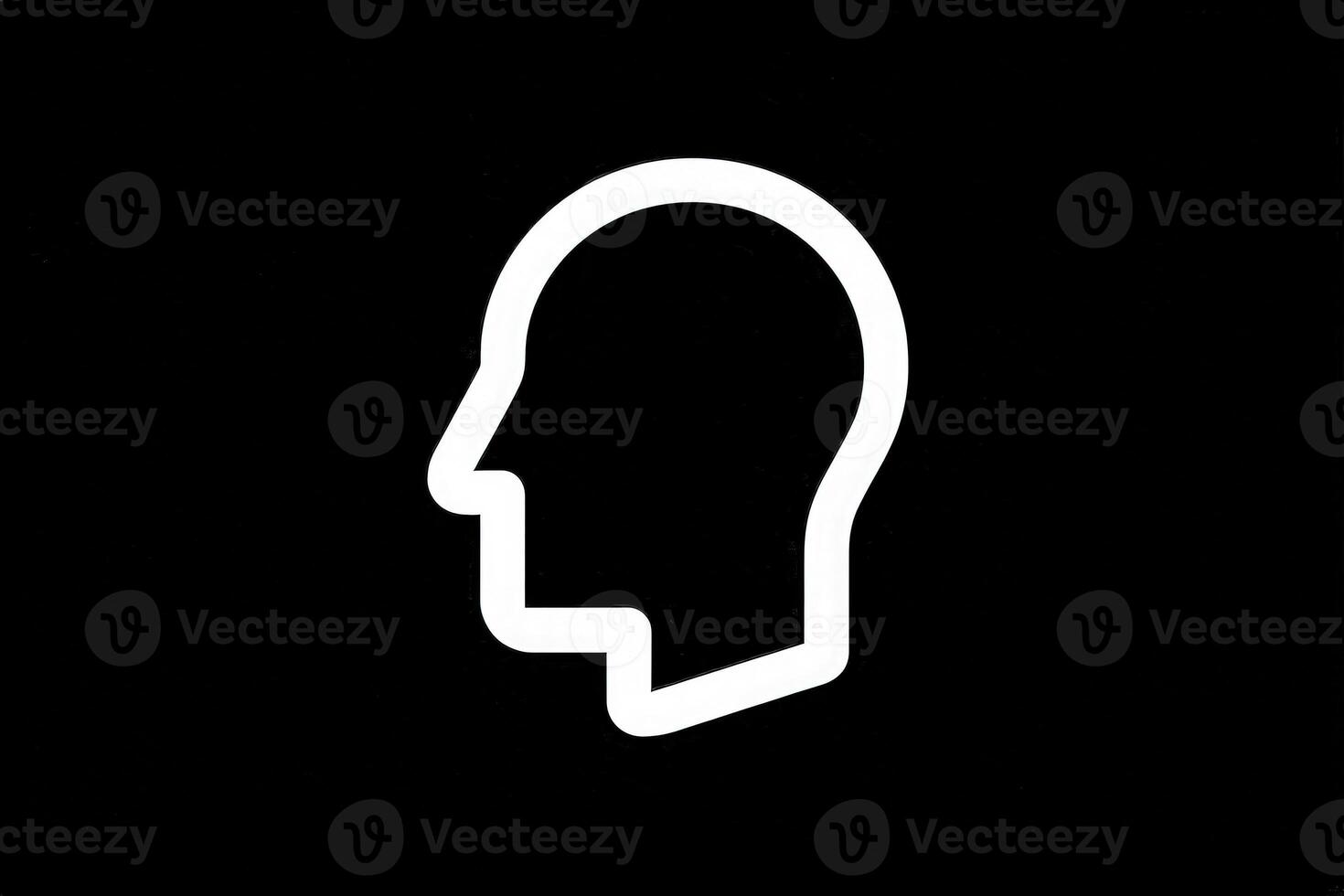 A minimalistic outline of a human head profile stands out against a solid black background. The design highlights creativity and simplicity, emphasizing the contours and features of the face. photo