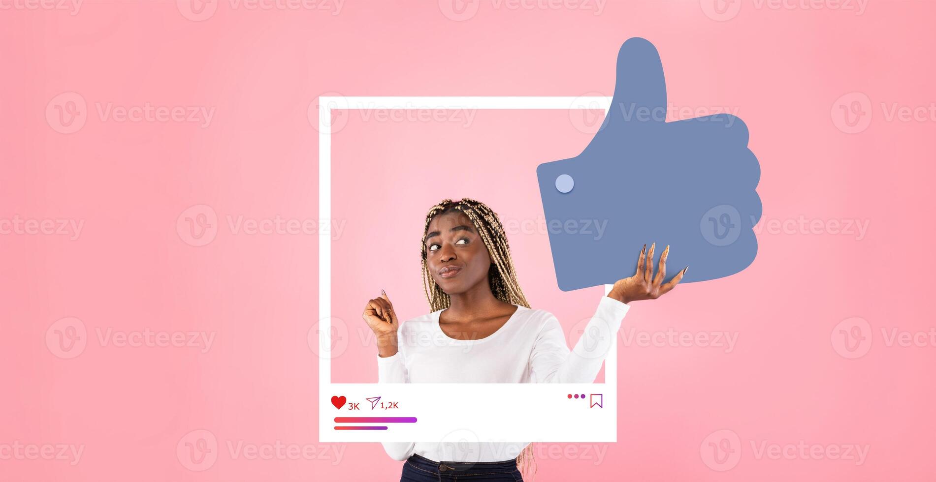 A social media influencer interacts with a thumbs up graphic, promoting positive engagement in a playful setting. The pink background adds a vibrant touch to the content creation experience. photo