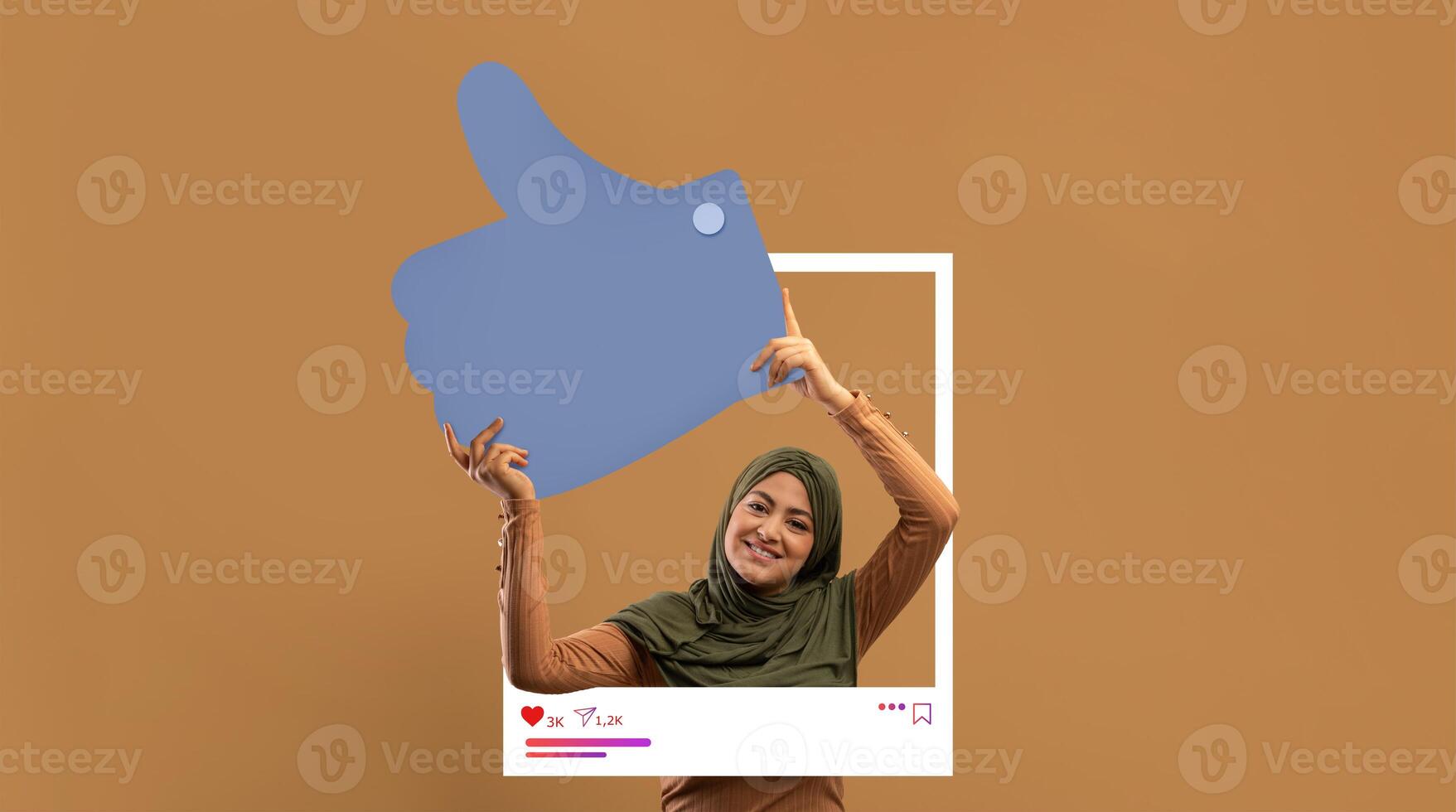 A lively influencer showcases enthusiasm while holding a large thumbs-up symbol. The backdrop is a warm, earthy tone, creating a welcoming atmosphere for online interaction and engagement. photo