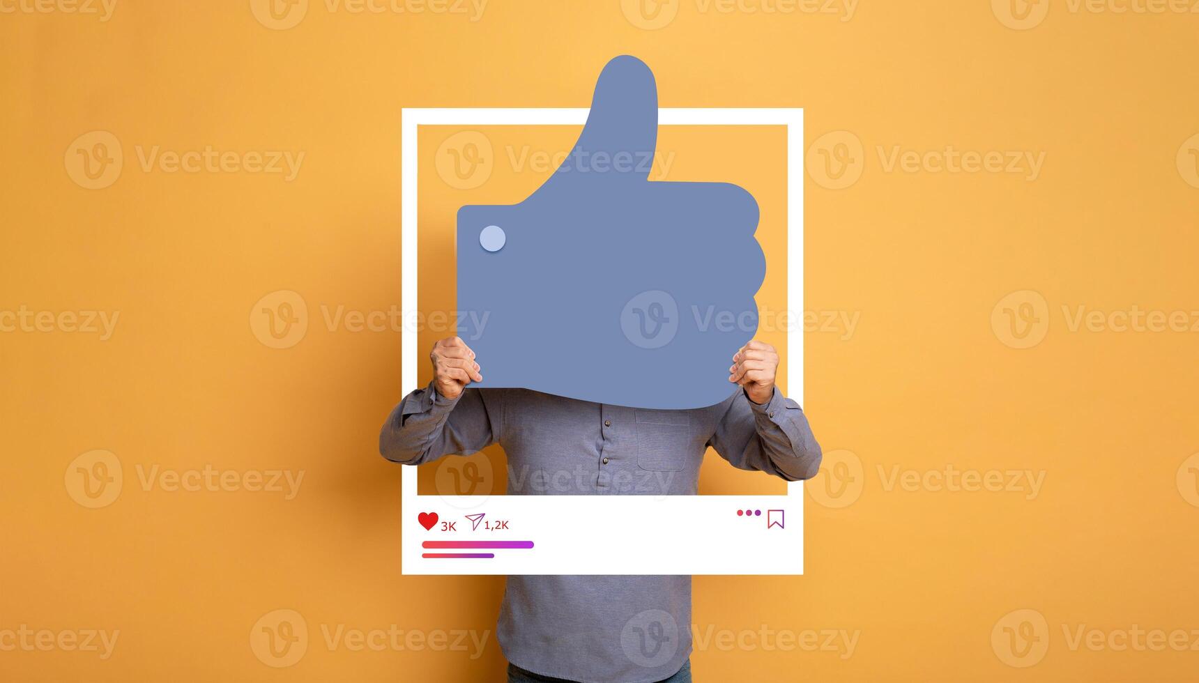A person holds a large thumbs up symbol in a bright yellow background, symbolizing approval and social media interaction. photo