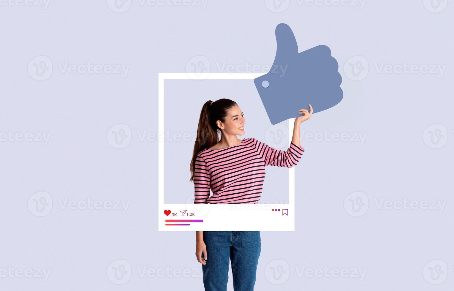 A young woman shares enthusiasm while giving a thumb up inside a social media frame. The playful backdrop emphasizes her role as a content creator and influencer. photo