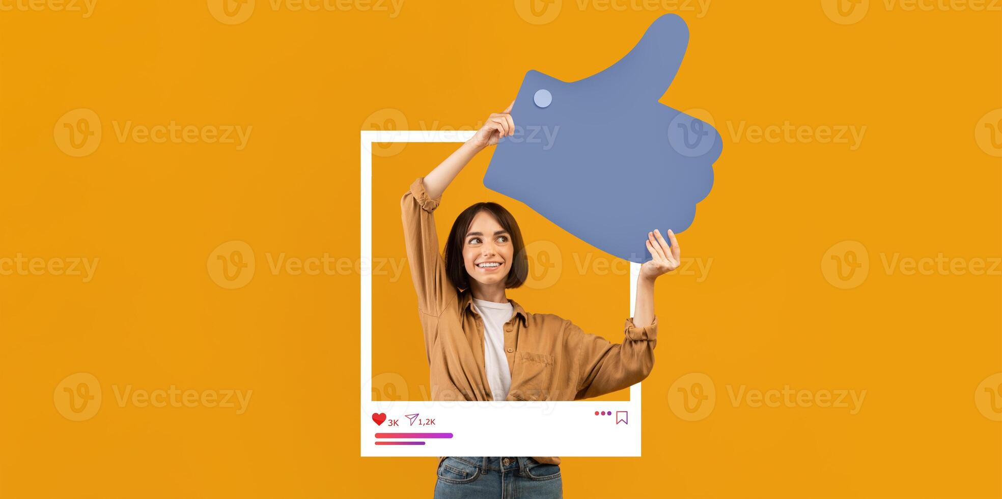 A content creator enthusiastically holds a large thumbs up icon against a vibrant yellow backdrop. She embodies positivity and engagement typical of social media influencers. photo