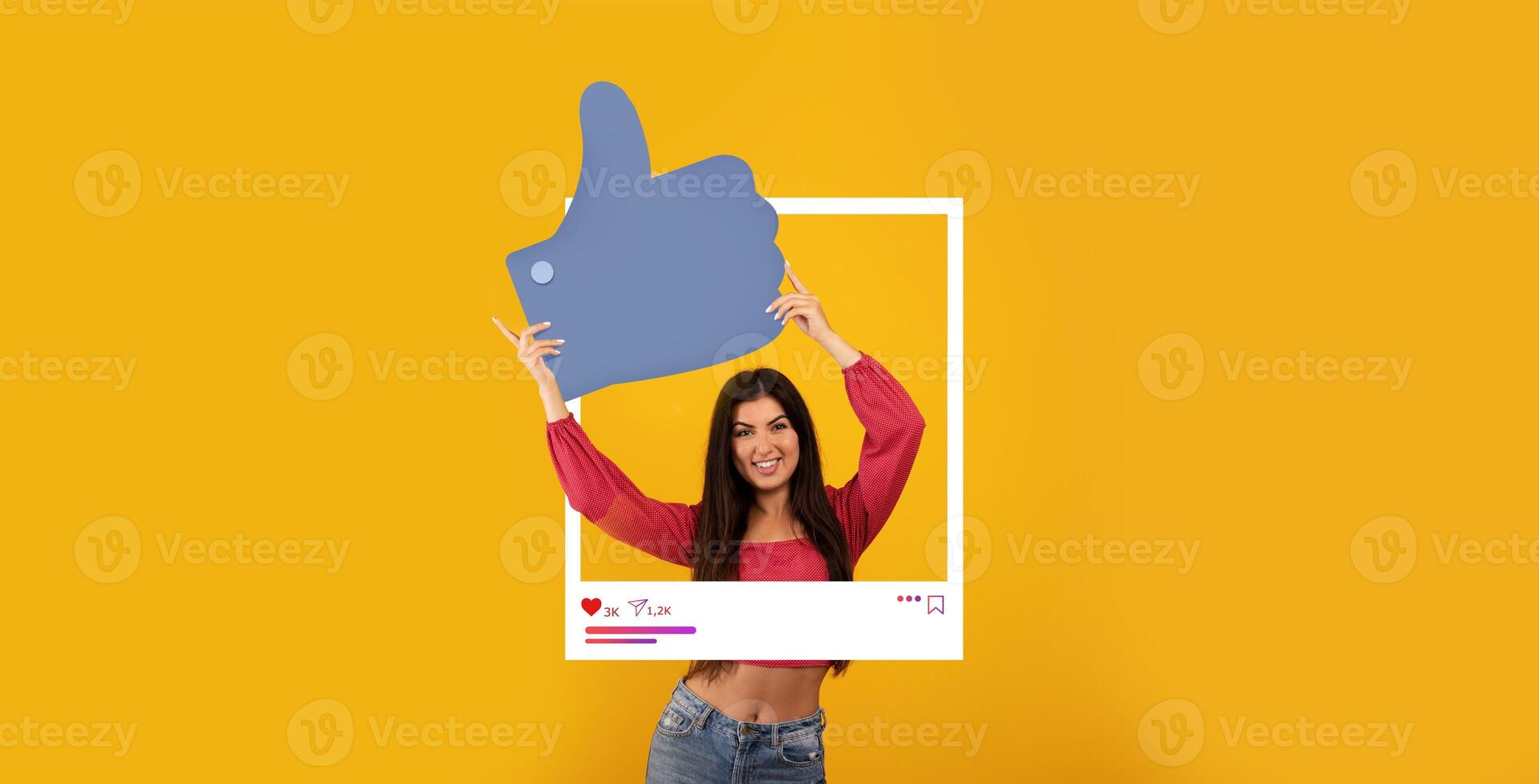 An influencer poses joyfully with a large thumbs up icon, surrounded by a bright yellow background. The setting emphasizes social media engagement, radiating positivity and connection. photo