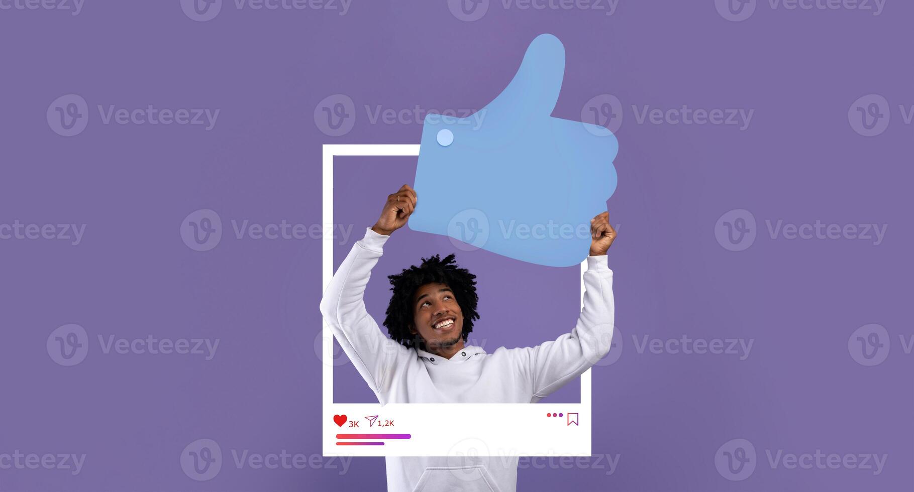 A smiling individual lifts a large thumbs-up symbol in a vibrant background, expressing excitement and positivity about social media interactions and online content. photo