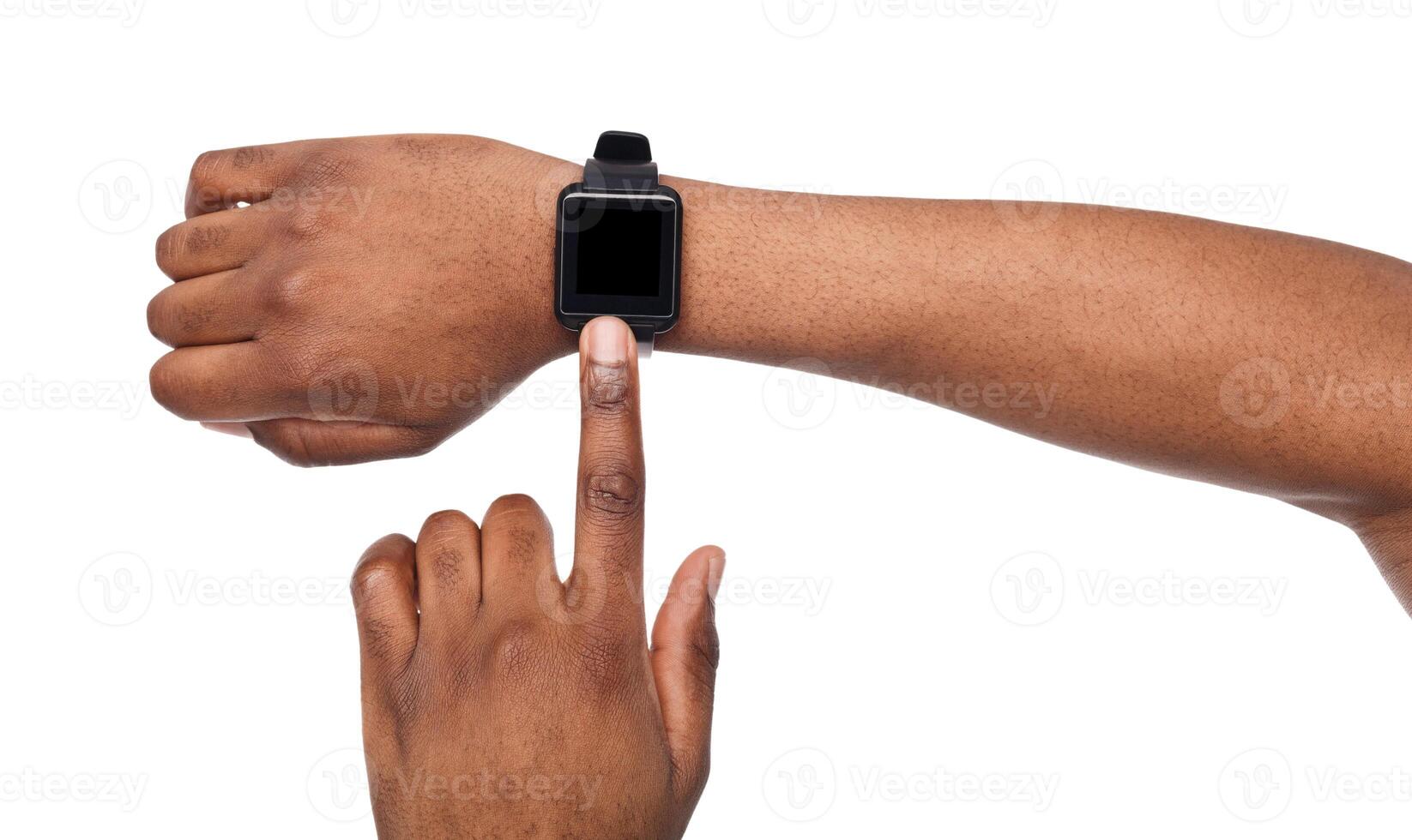 Smart watch at black male hand, white background cutout. Smartwatch - modern digital gadget with empty display, copy space photo
