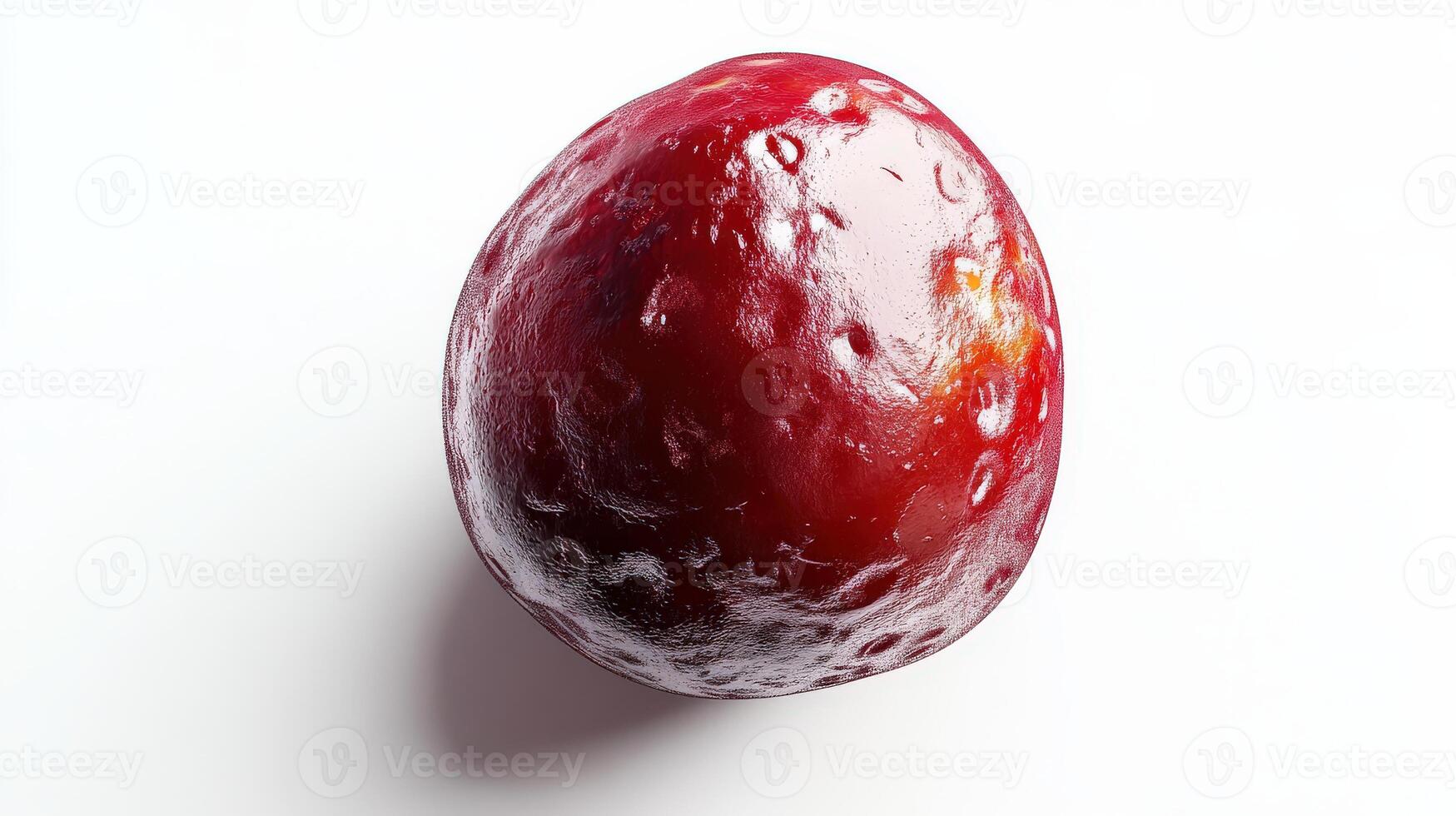 Close-up view of a glossy, textured, red sphere. photo