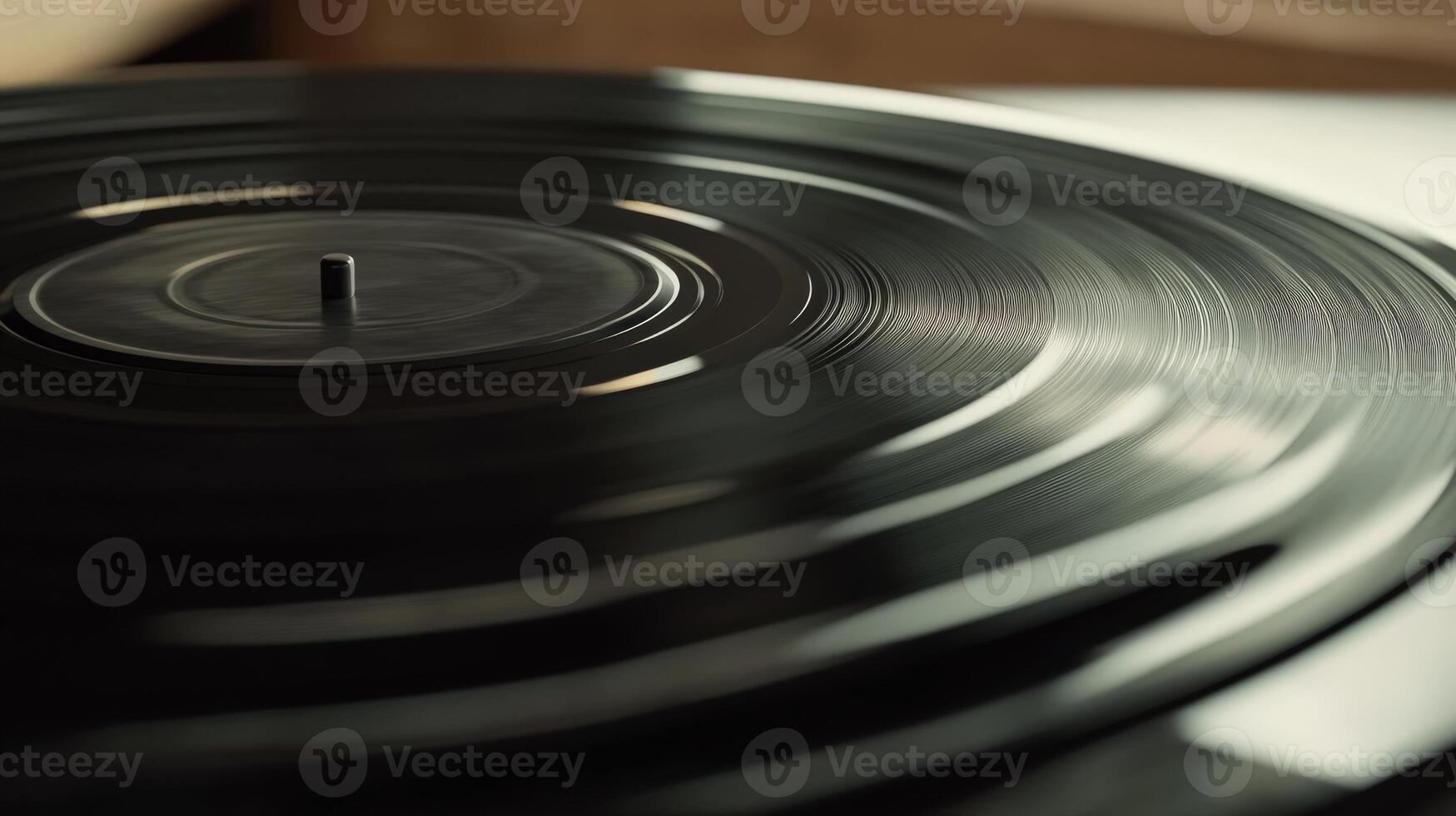 Close-up view of a spinning vinyl record player. photo