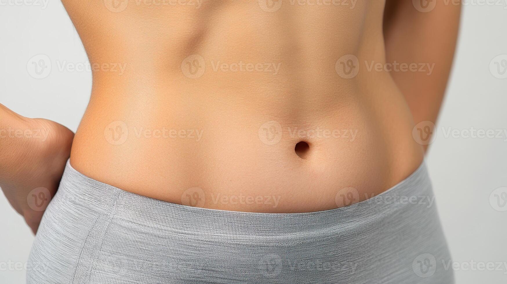 A woman's stomach with a small area of skin photo