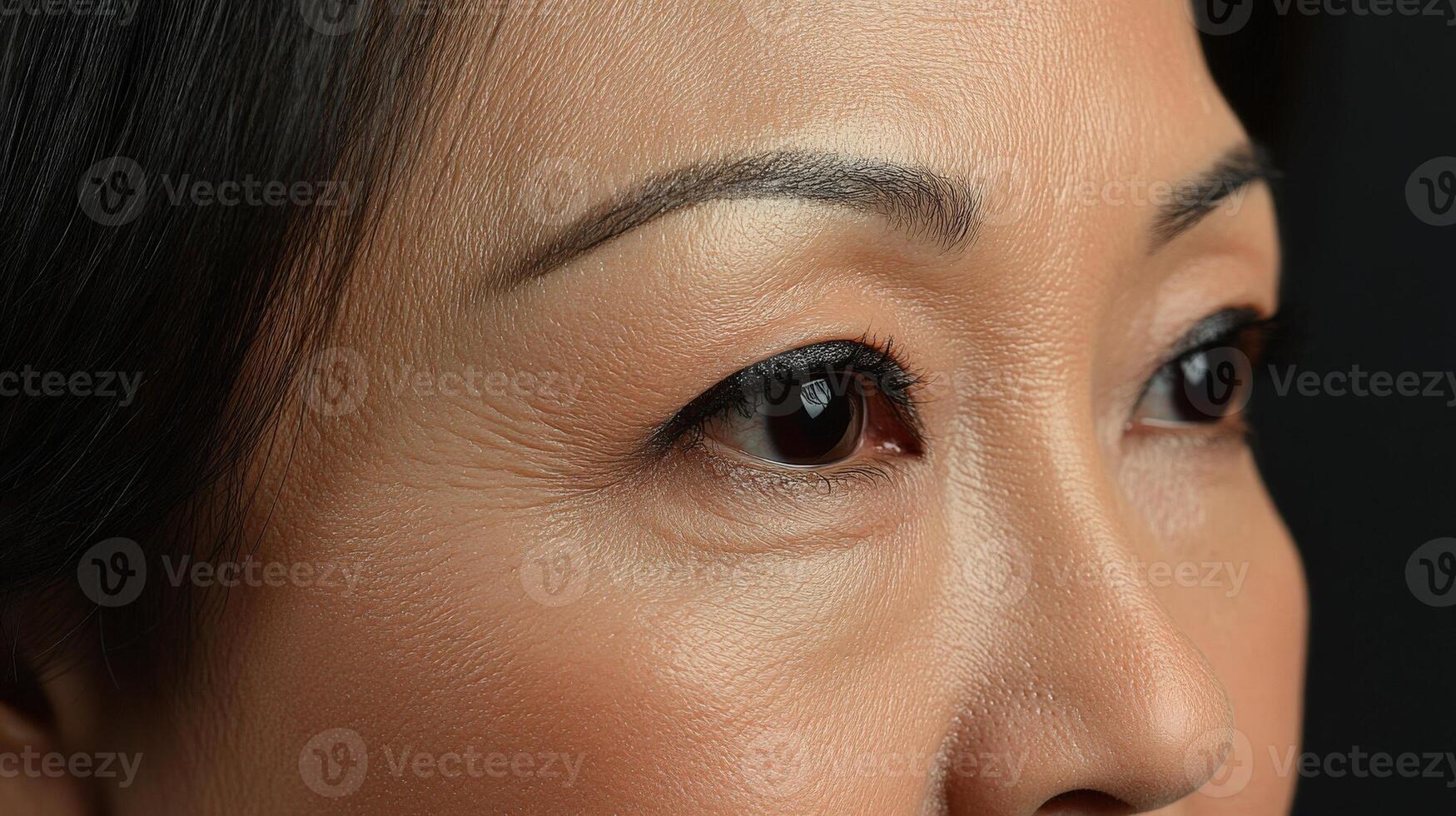 Close-up facial portrait of mature person with visible wrinkles. photo