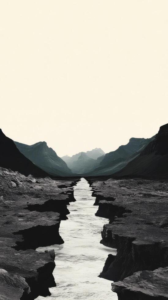 Monochrome Mountain River Landscape A Serene Journey Through a Majestic Valley. Discover the tranquil beauty and dramatic power of nature in this breathtaking landscape photograph. photo