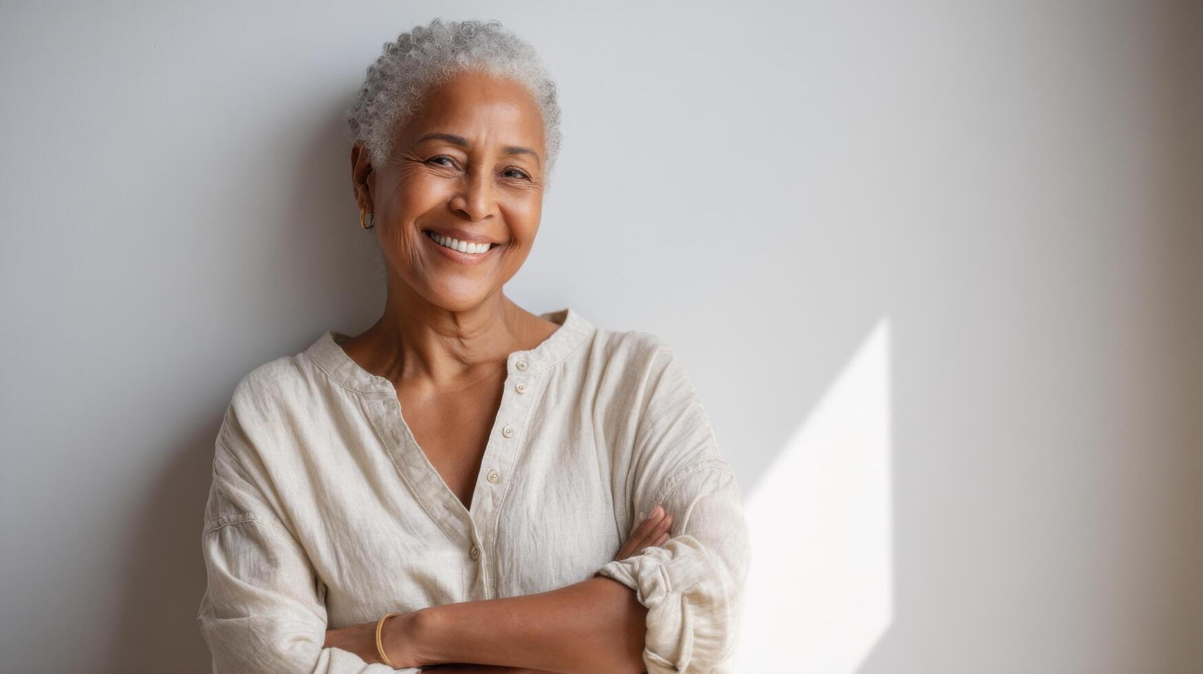 Portrait of a Happy Senior Woman with Gray Hair and a Confident Smile. A Captivating Image Showcasing Beauty, Elegance, and Posit photo