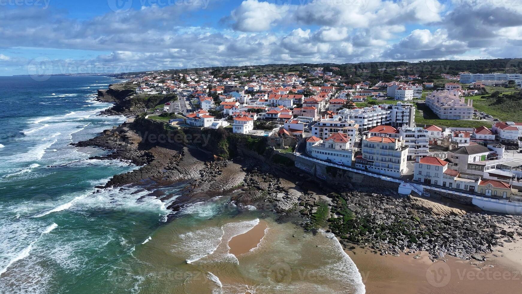 Aerial View of Macas Beach in Sintra District of Lisbon in Portugal . Building Archipelago. photo