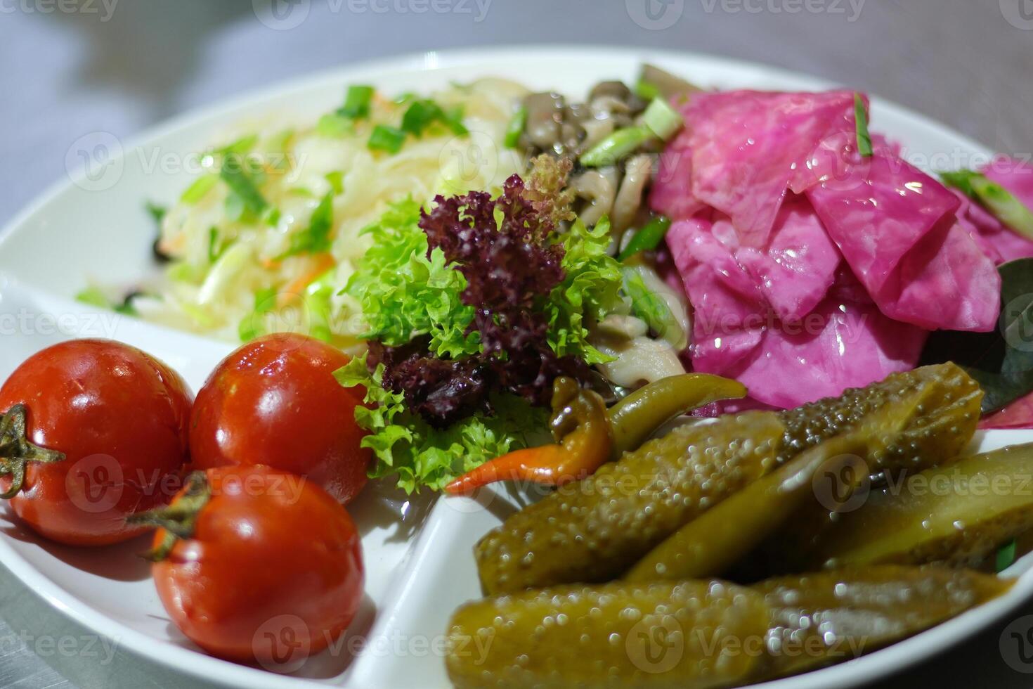 Pickled vegetables plate Assorted mixed pickled vegetables in bowl plate, Turkish name tursu. photo