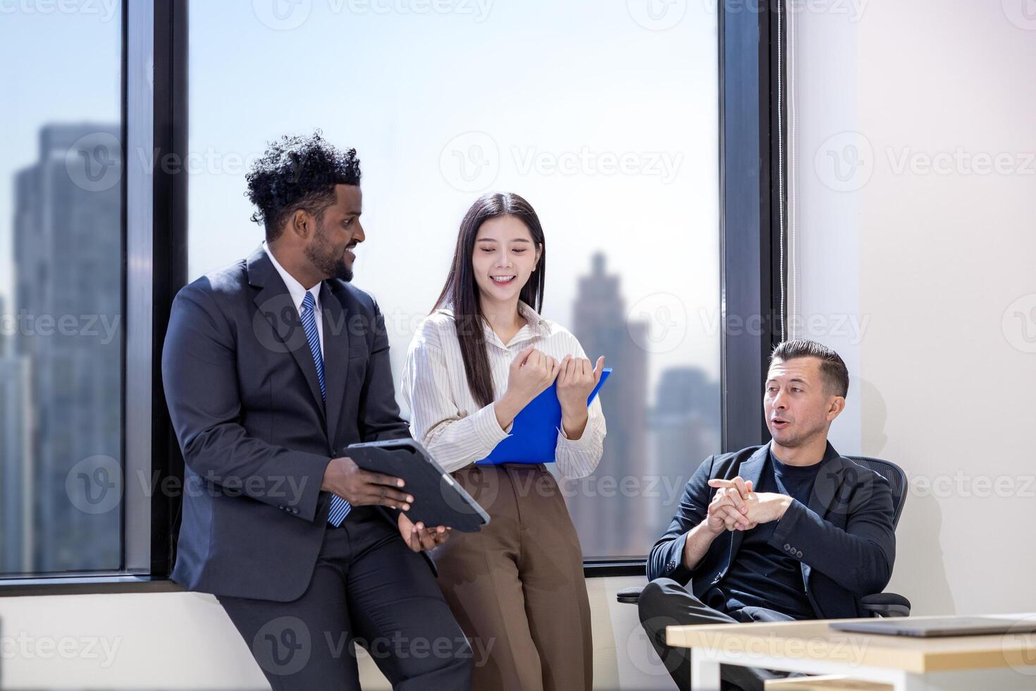 Diversity team of business people are discussing over the new strategic strategy project over investment real estate while working in modern office building for new project and planning photo