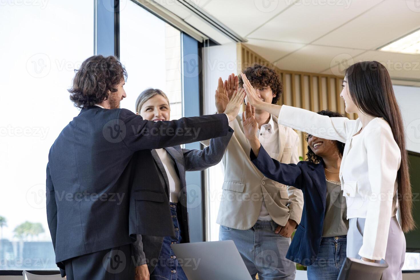 Team of diversity businessman entrepreneurs and startup have business meeting and encouraging each other for good energy to accomplish successful marketing plan photo