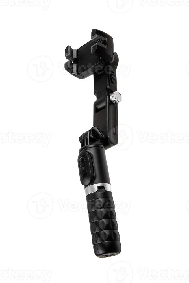 Portable gimbal with a firm grip and adjustable phone mount for smooth capture. photo