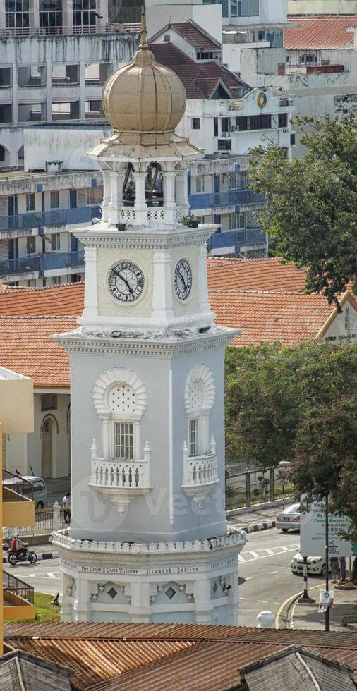 A clock tower with a clock on it photo