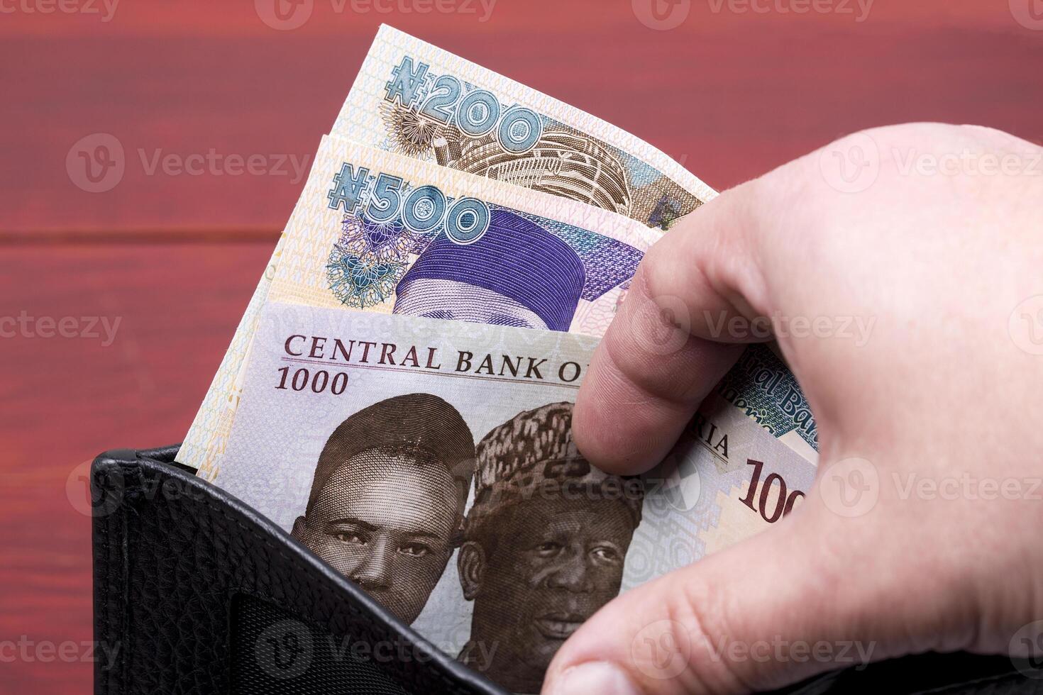 Nigerian money - Naira in the black wallet photo