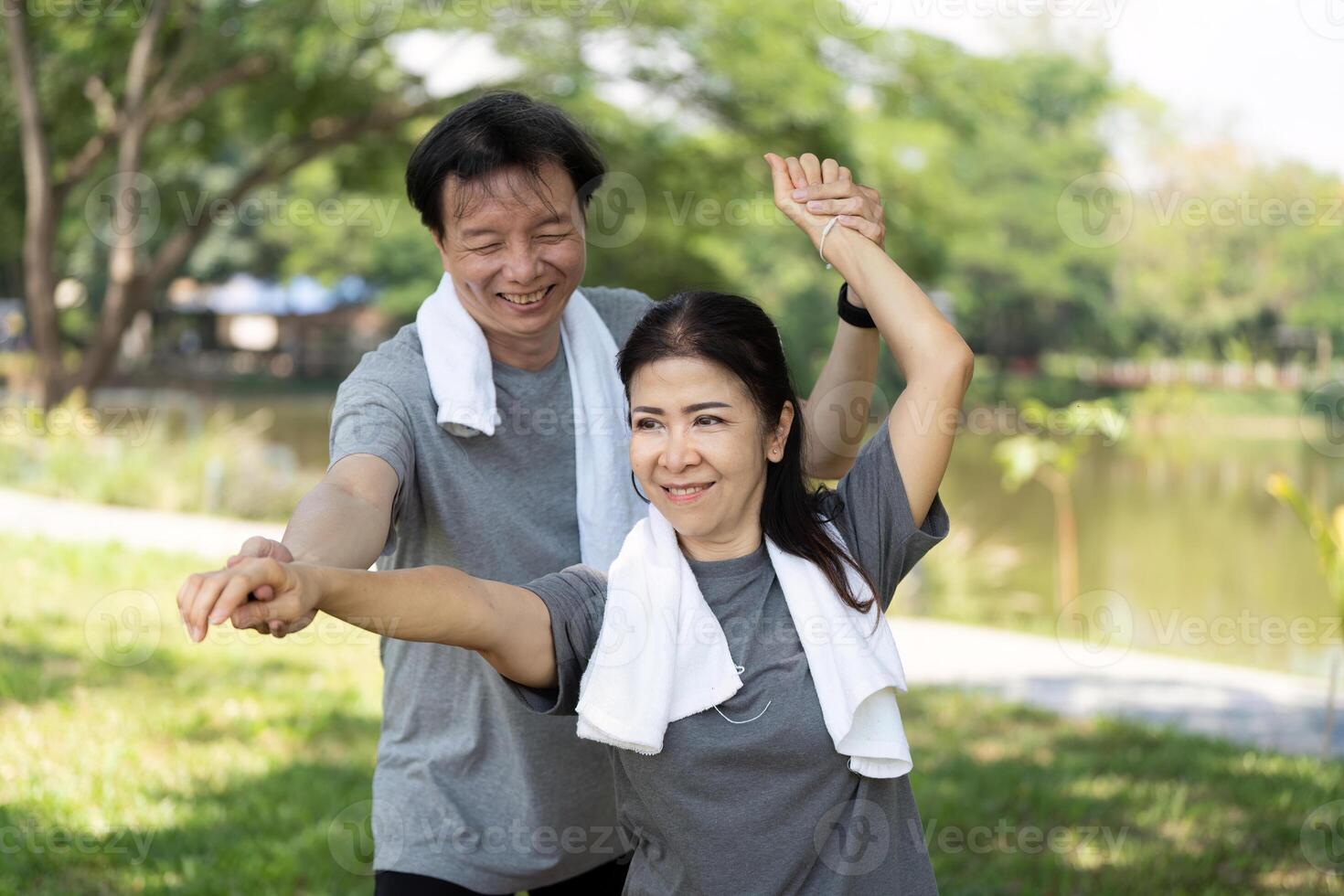 Wellness fitness for seniors. couple having fun during yoga photo