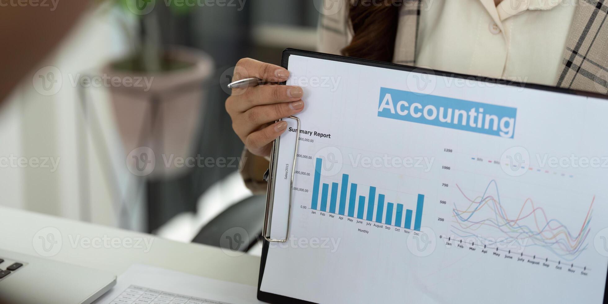 Accounting Insights and Data Analysis. Professional presenting financial charts and reports. photo