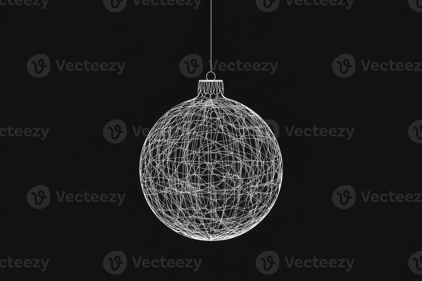 Stylish Christmas ball silhouette with intricate thin line design hanging against a dark background during the festive season photo