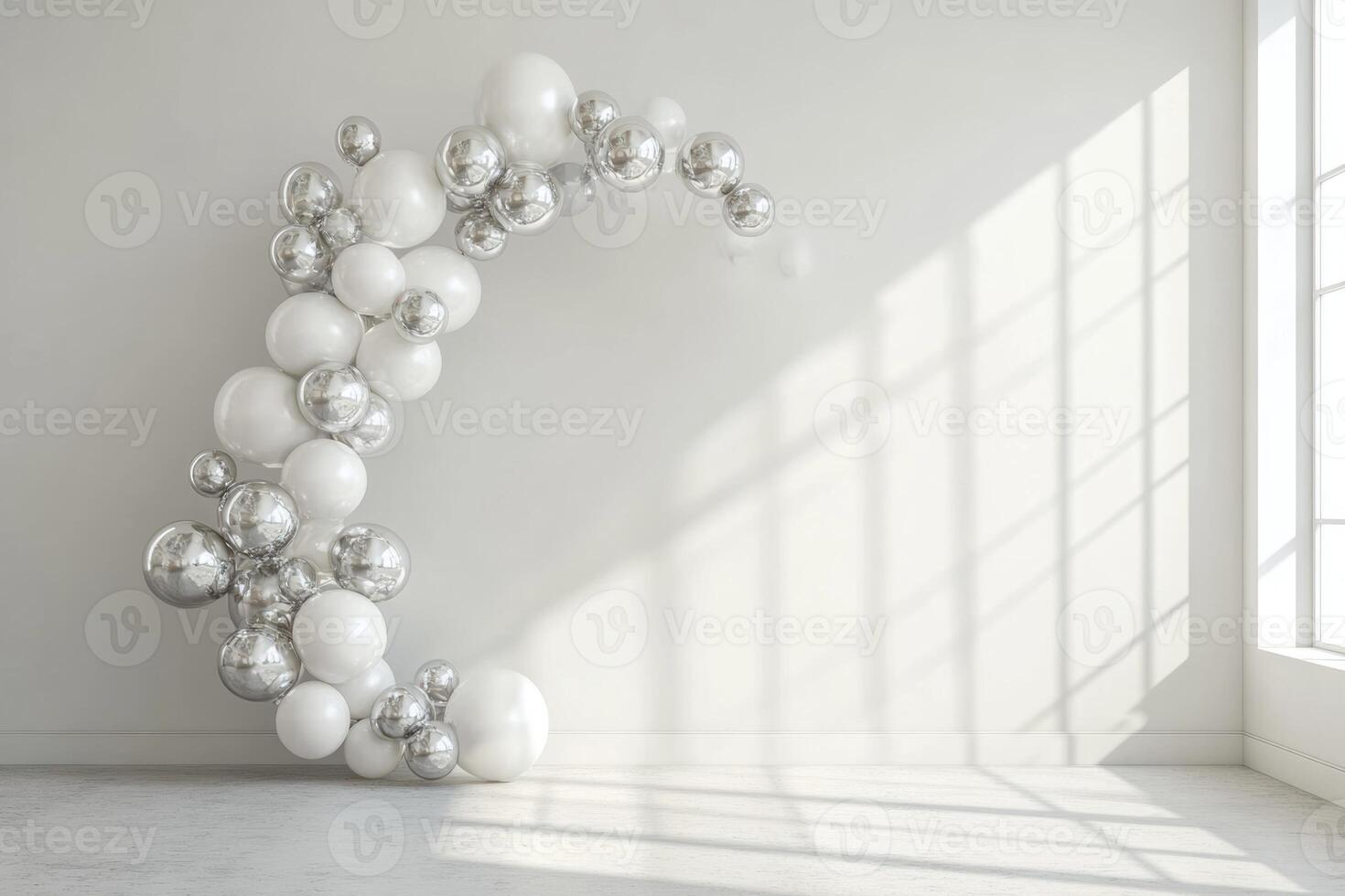 Elegant minimalistic white and silver balloon arch in a clean room for a special celebration event setup photo