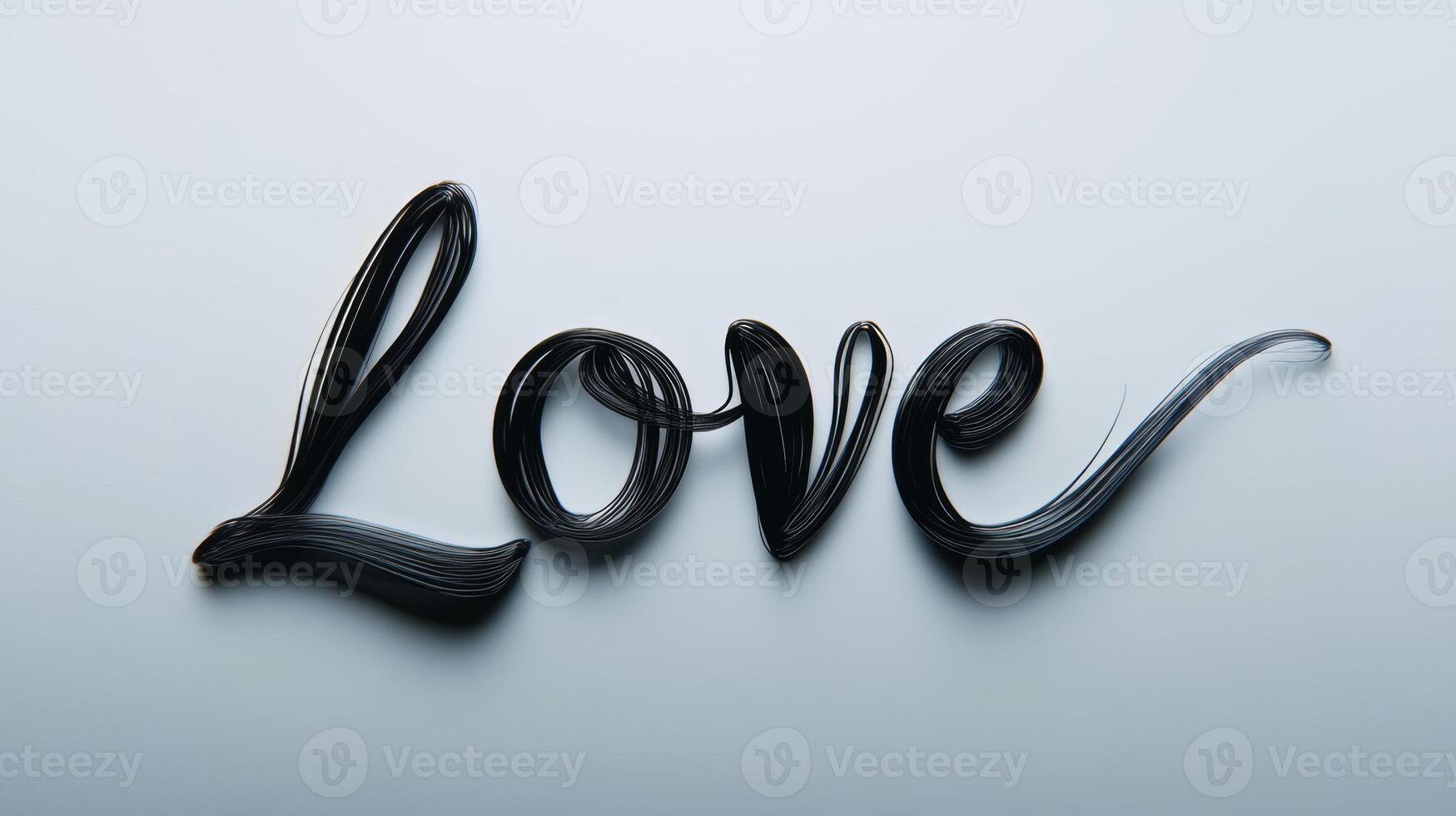 Elegant black cursive text spelling love with a flowing underline on a soft white background showcasing the beauty of affection and artistry photo