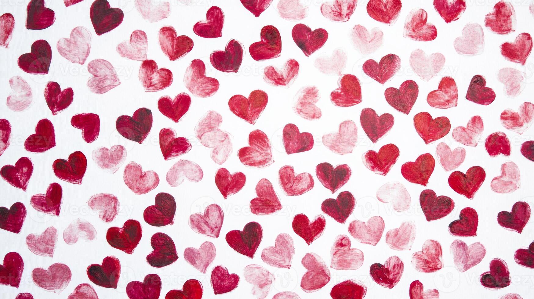 A lively pattern of playful red and pink hearts scattered across a pristine white background for a joyful and energetic ambiance photo