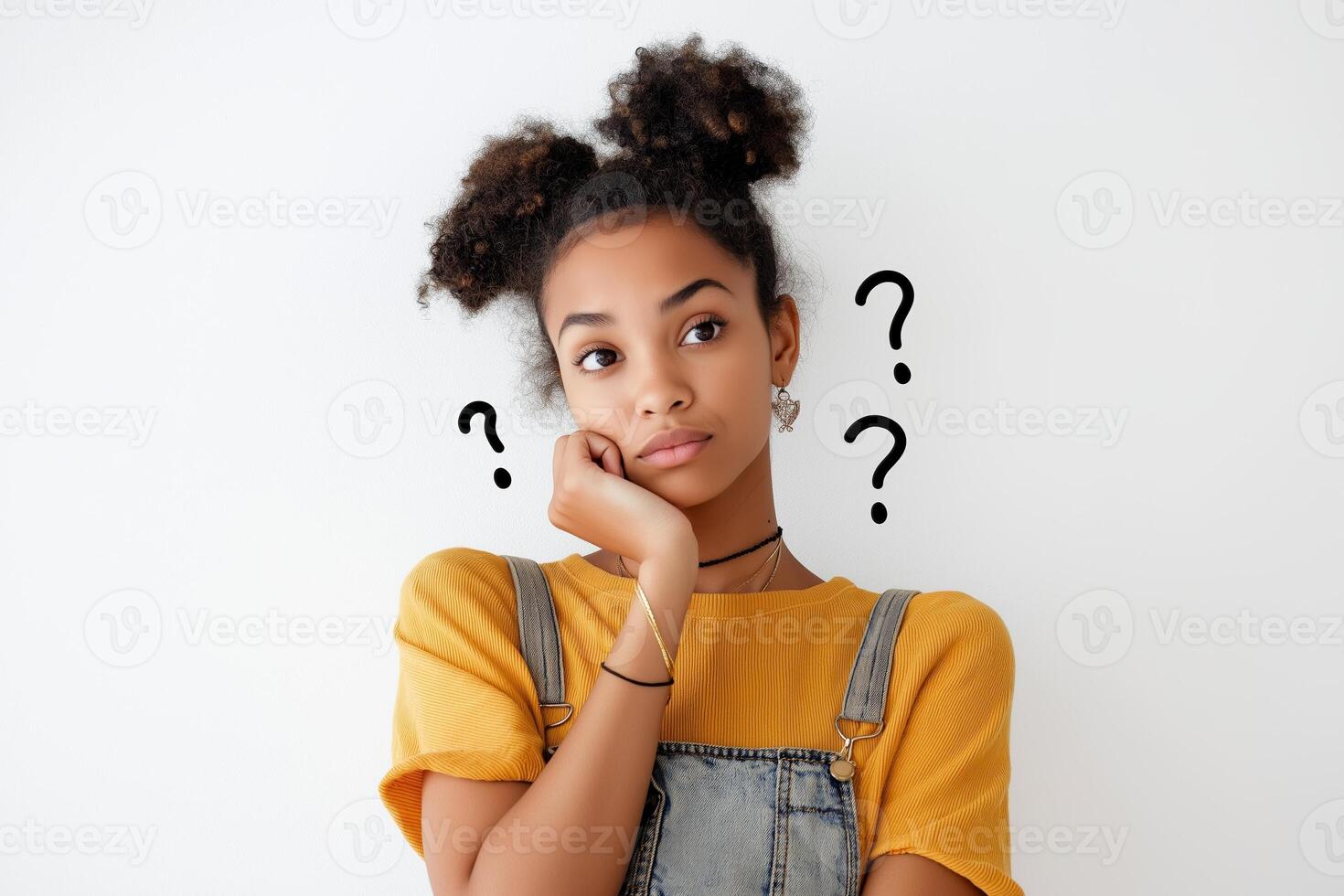 A young woman in a thoughtful pose with her hand on her chin and question marks, reflecting curiosity and contemplation in a bright setting photo