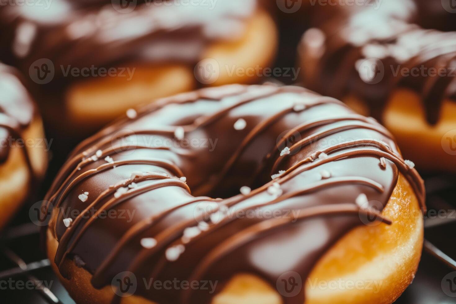 Delicious chocolate cronut donut viewed up close with a soft texture and rich glaze, perfect for a sweet treat at any time photo