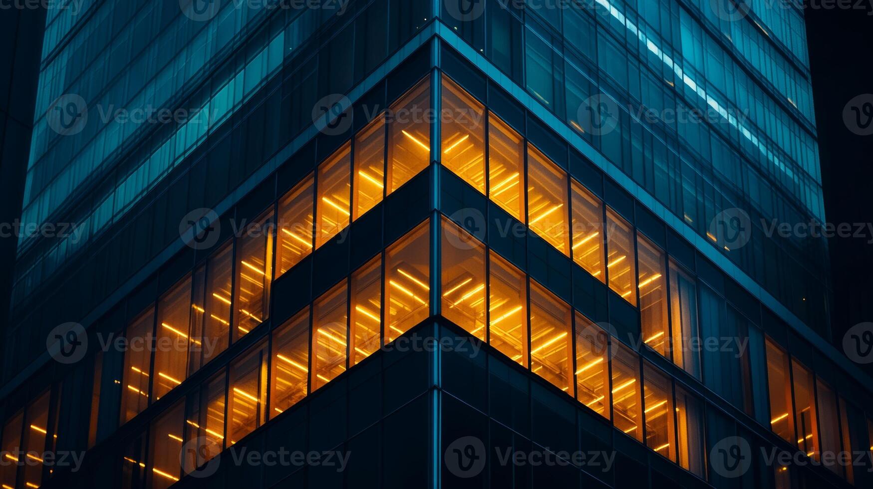 Urban skyscraper illuminated at night with striking orange and blue colors creating a captivating effect photo